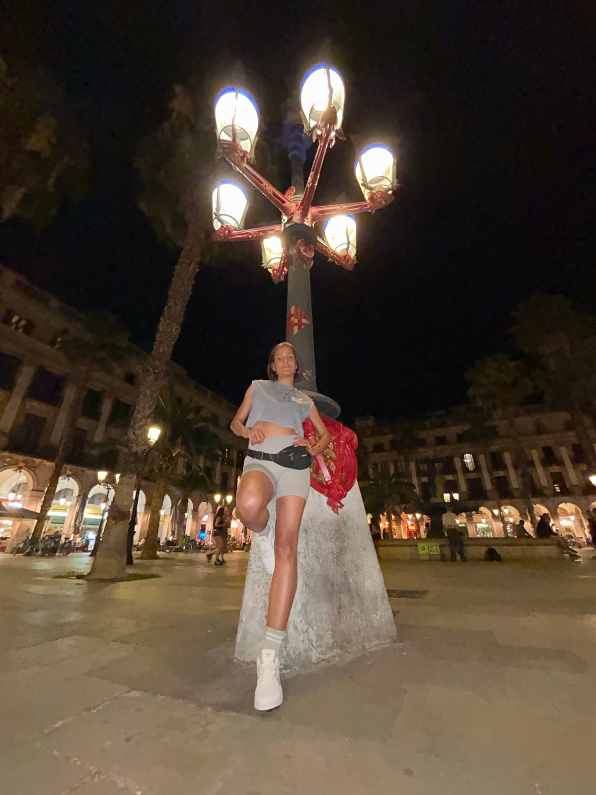 Evening crowds gather in Barcelona's central plazas for photos