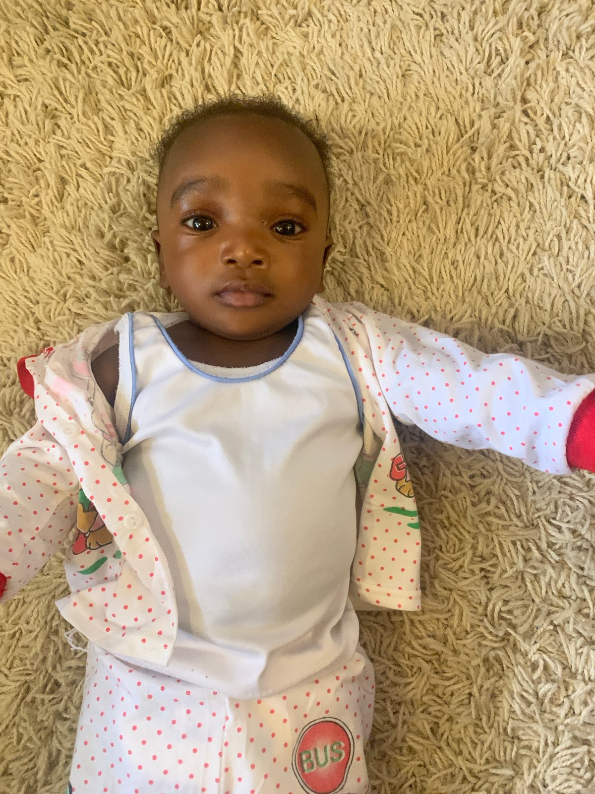 Infant observed on carpet in Barakin Akawo, Nigeria