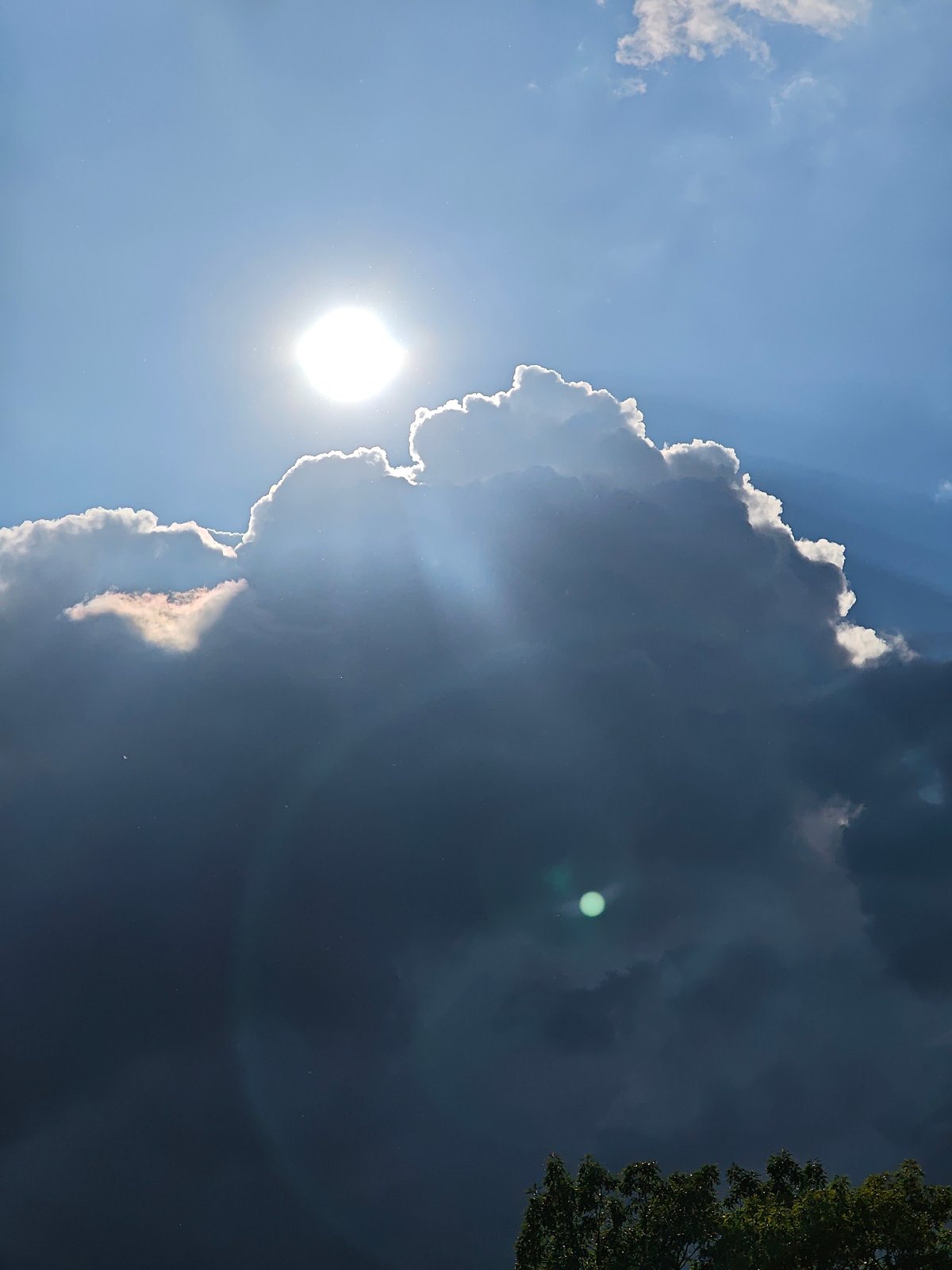 Dramatic sunbeams break through storm clouds over Vratsa, Bulgaria