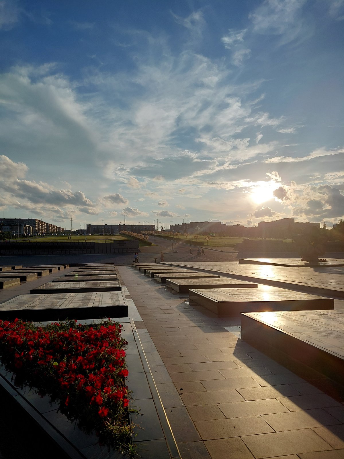 Exploring Magnitogorsk monuments and riverfront on a summer evening