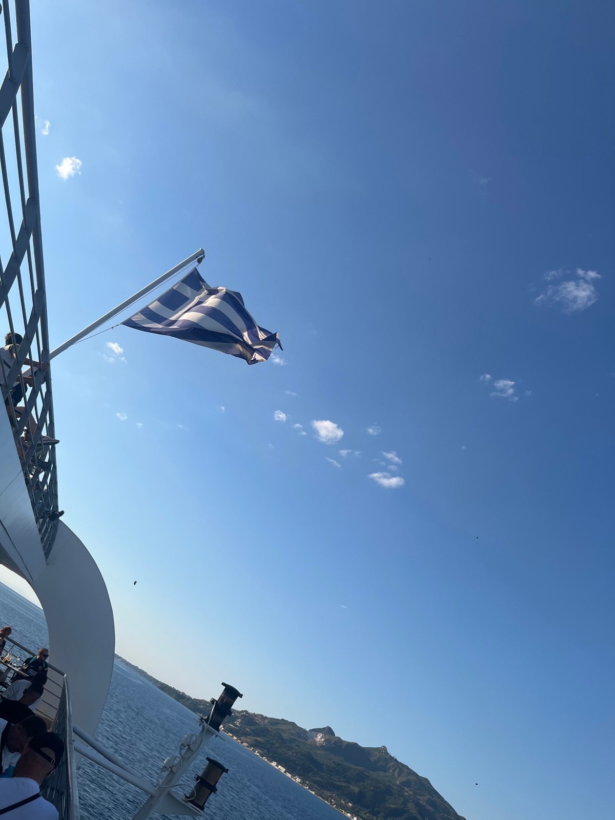 Ferry leaving Zakynthos harbor on a bright June morning