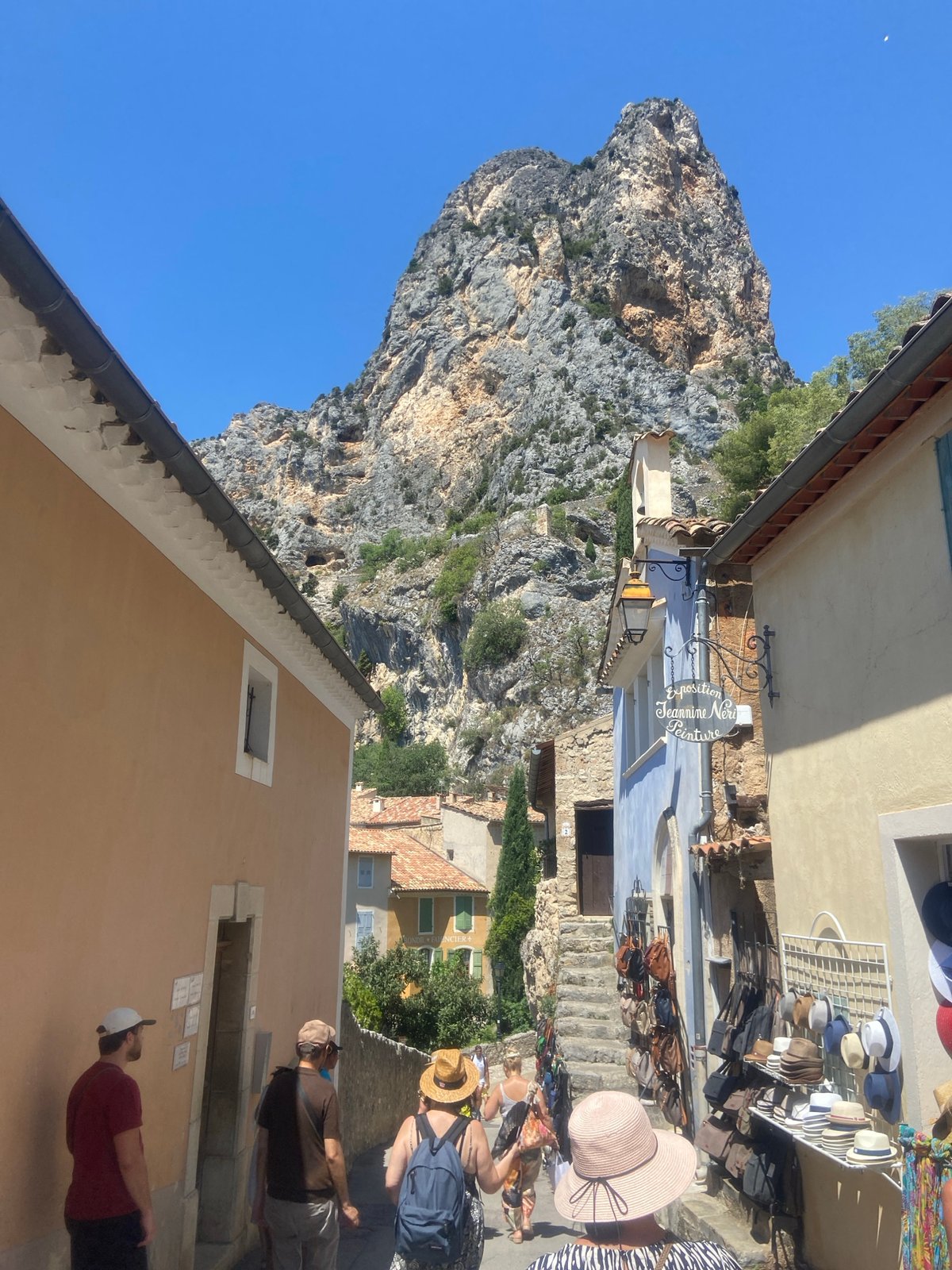 Exploring a sun-drenched hilltop village carved into the cliffs