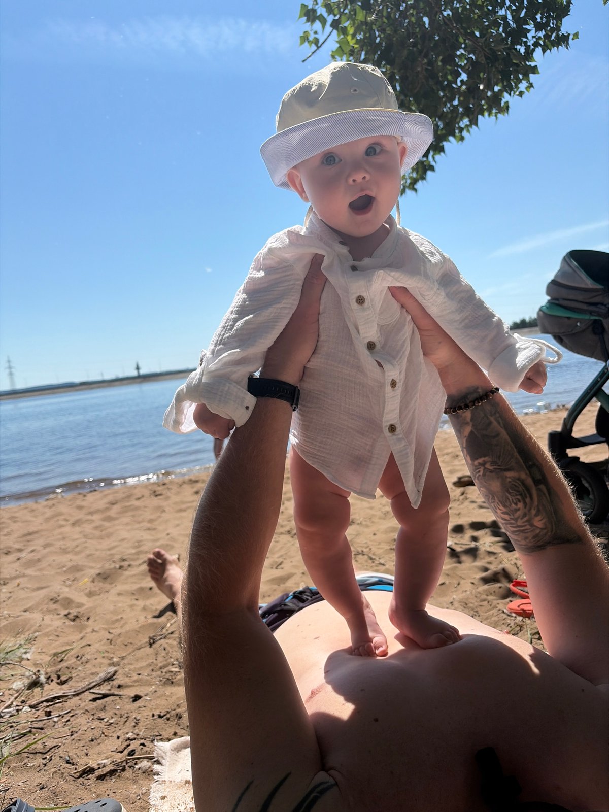 Family beach day on the waterfront in Chaikovsky, Russia