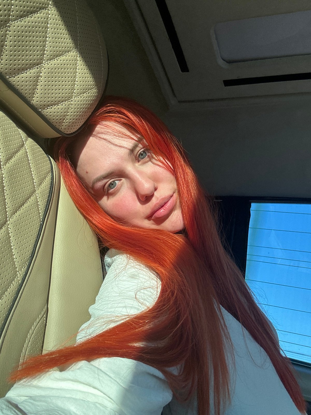 Sunroof selfie session in a parked car, Eyüpsultan
