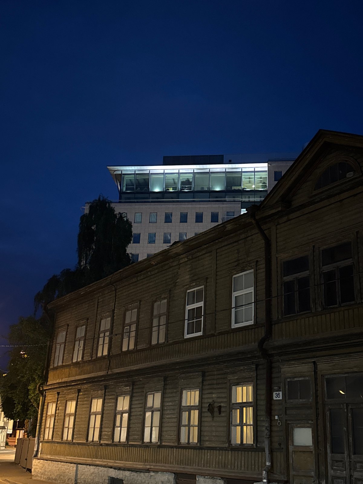 Evening street documentation captures Tallinn storefronts and architecture