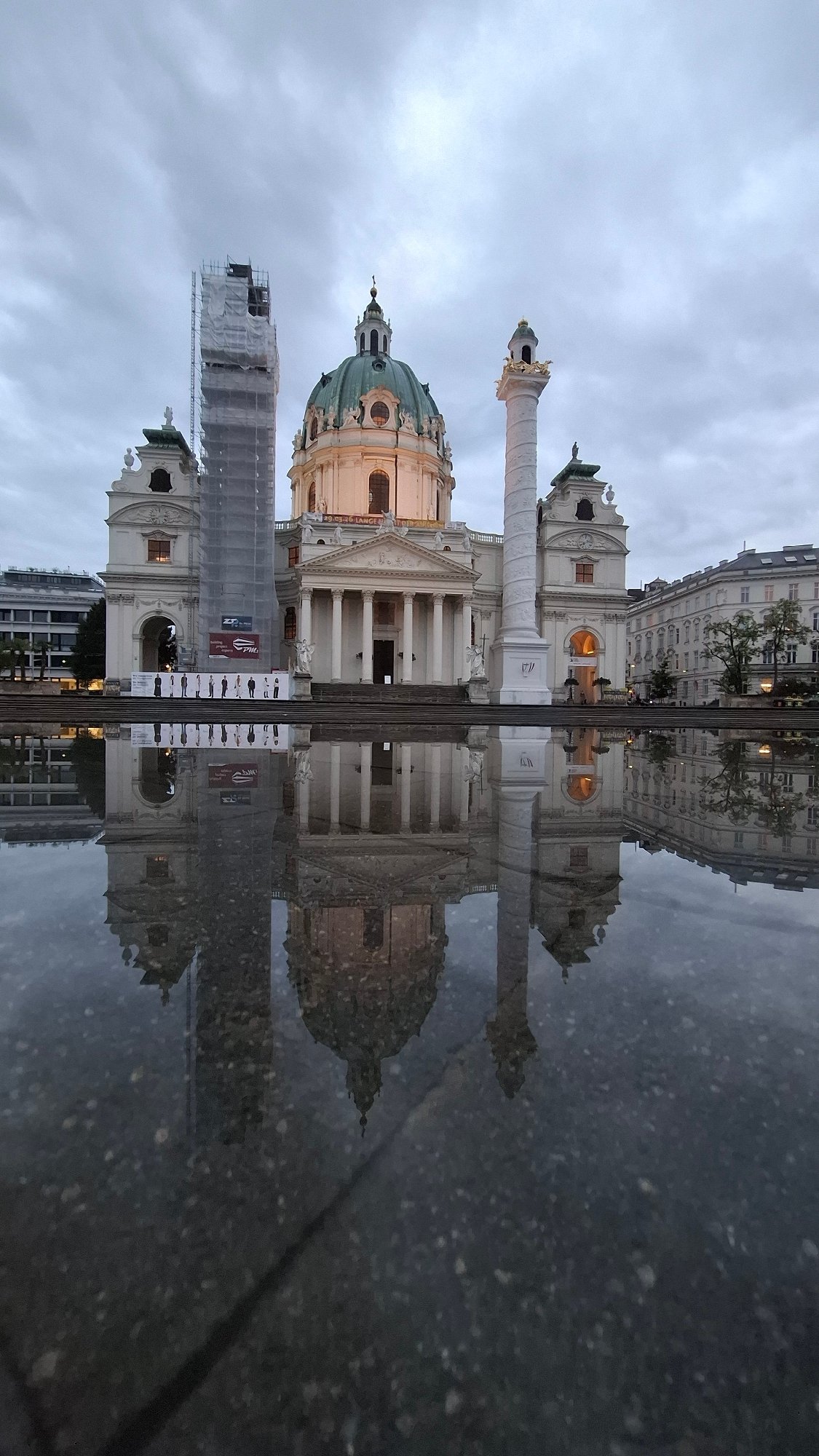 Vienna witness captures cathedral reflection and indoor abstract art