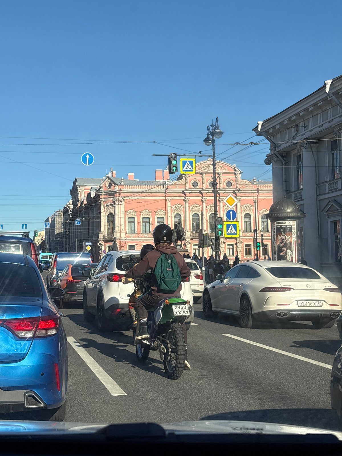 Sunny afternoon boat activity documented across Saint Petersburg waterways