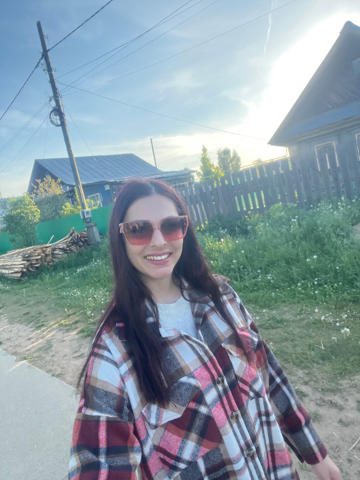 Woman photographed on residential street in Chaikovsky, Russia