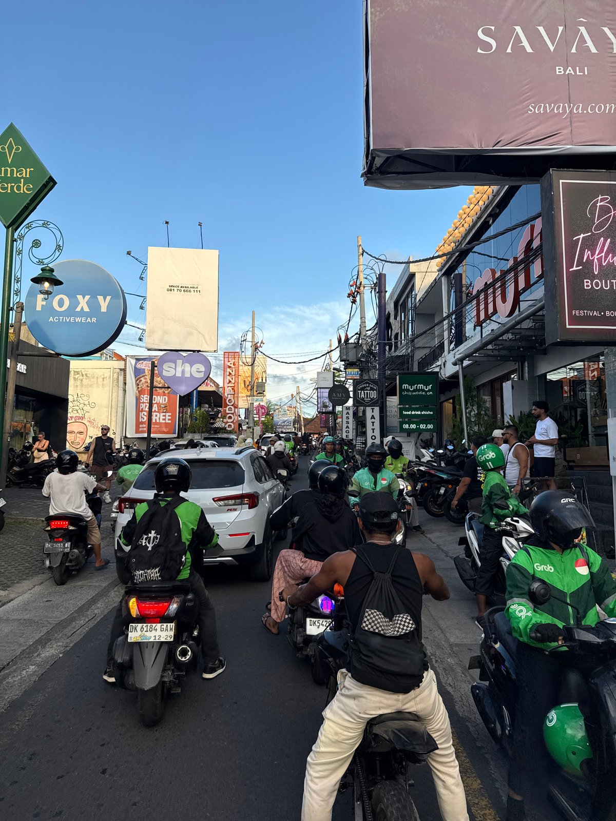 Rush hour traffic clogs North Kuta streets with delivery drivers