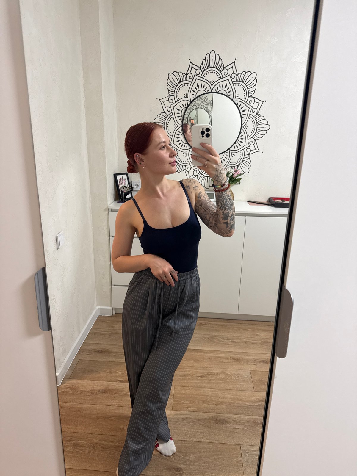 Woman takes mirror selfies in Rostov-on-Don apartment