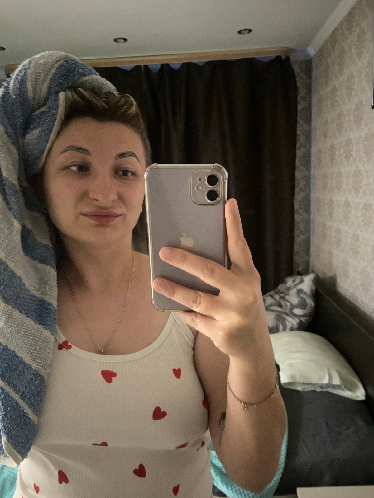 Casual indoor selfies from a bedroom in Prokopyevsk