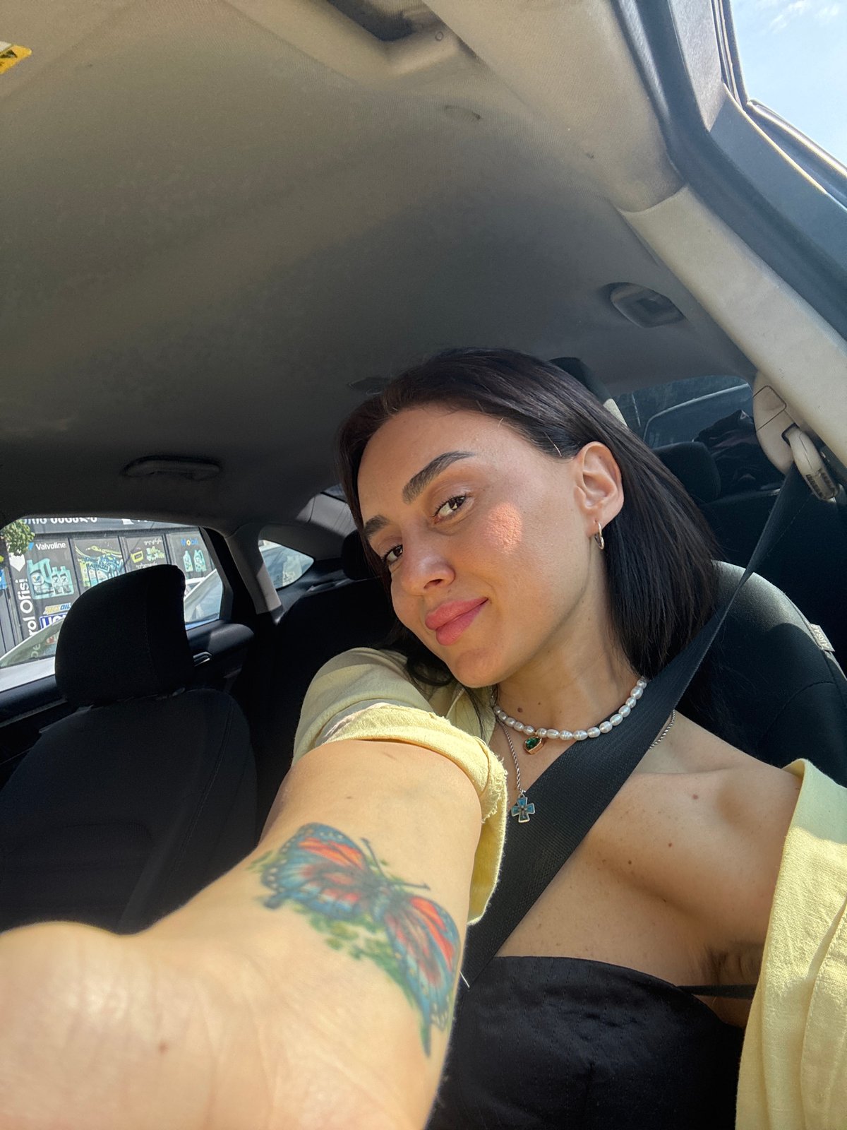 Car selfies and street scenes from a Tbilisi morning