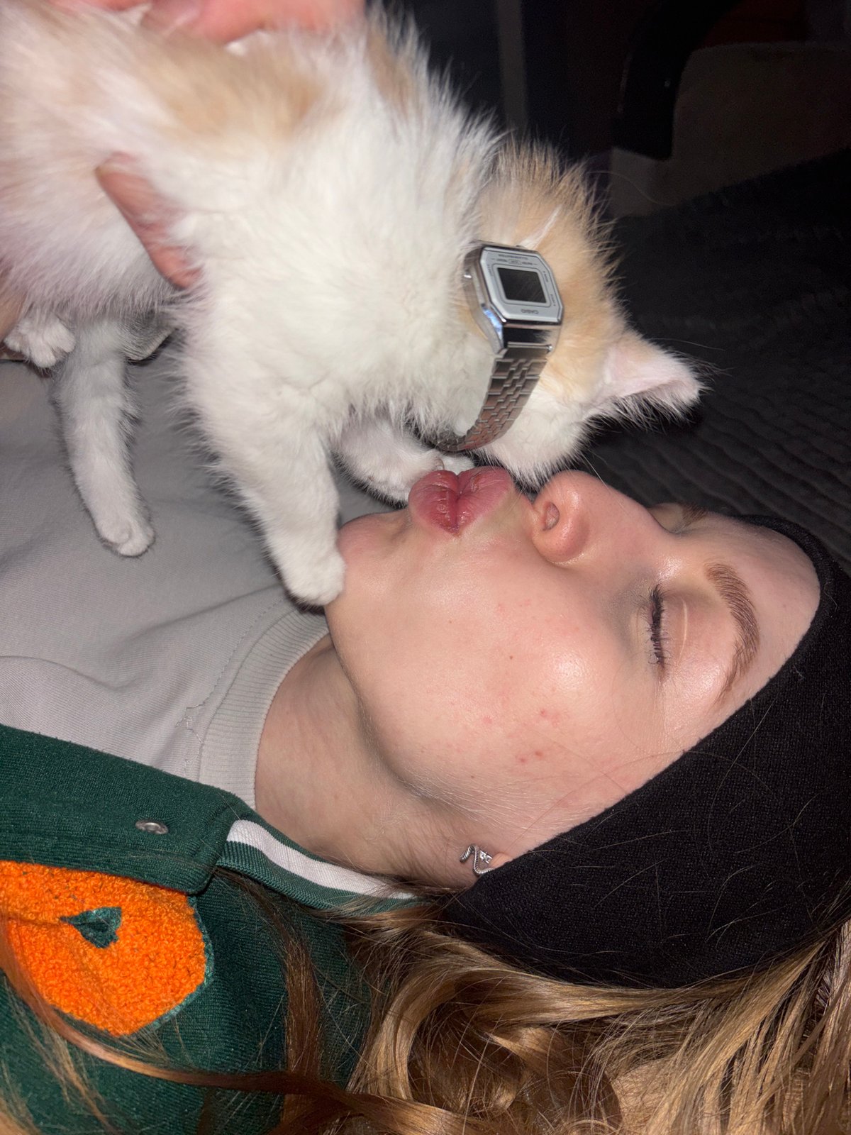 Woman photographed with kitten in quiet domestic moments, Perm