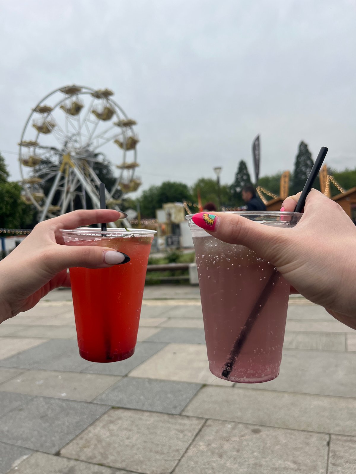 Visitors enjoy colorful drinks at Sofia amusement park