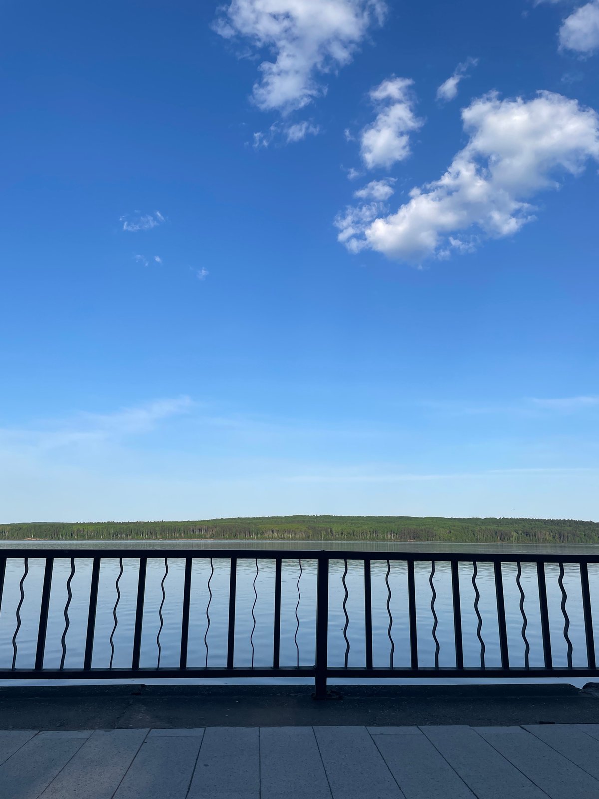Afternoon waterfront life documented in Chaikovsky, Russia