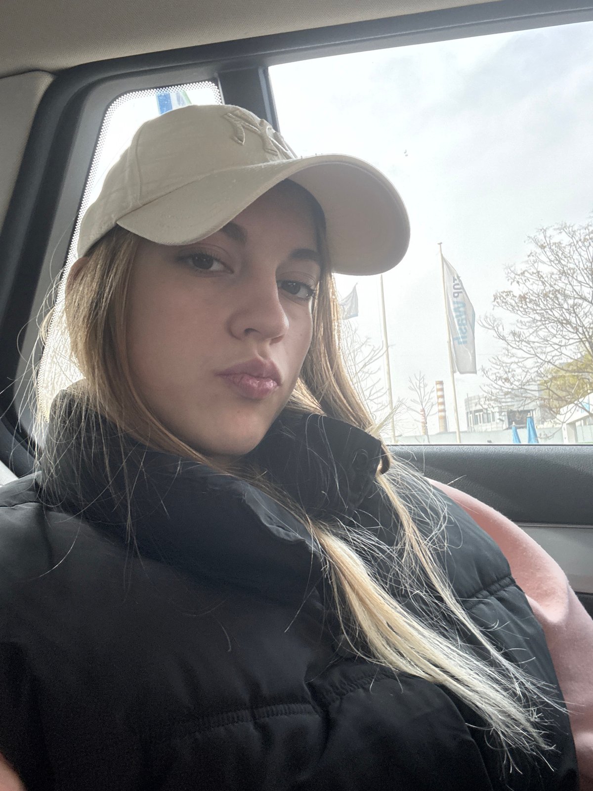 Woman in baseball cap observed in vehicle in Sofia