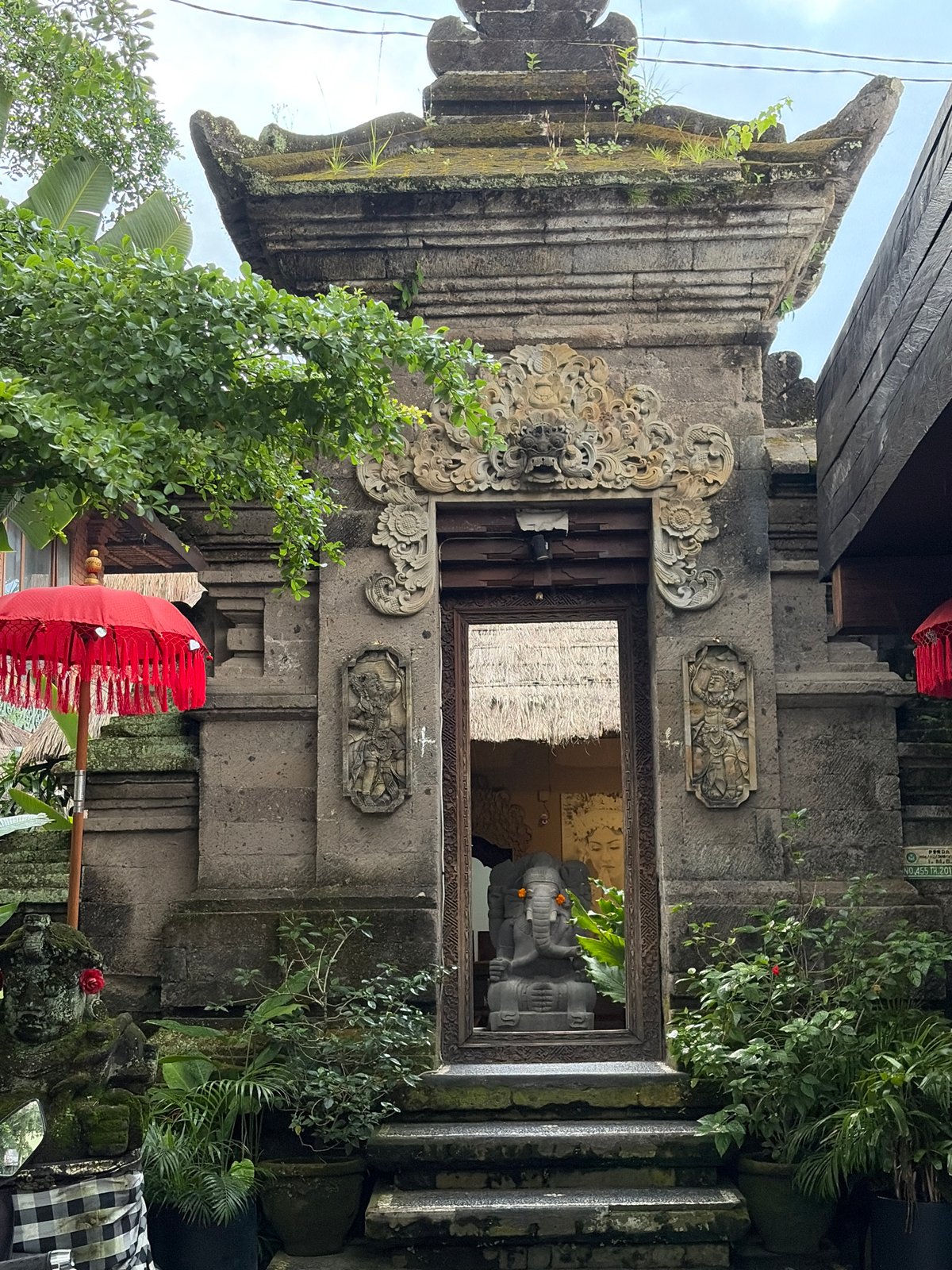 Ubud street level: shops, shrines, and Balinese detail