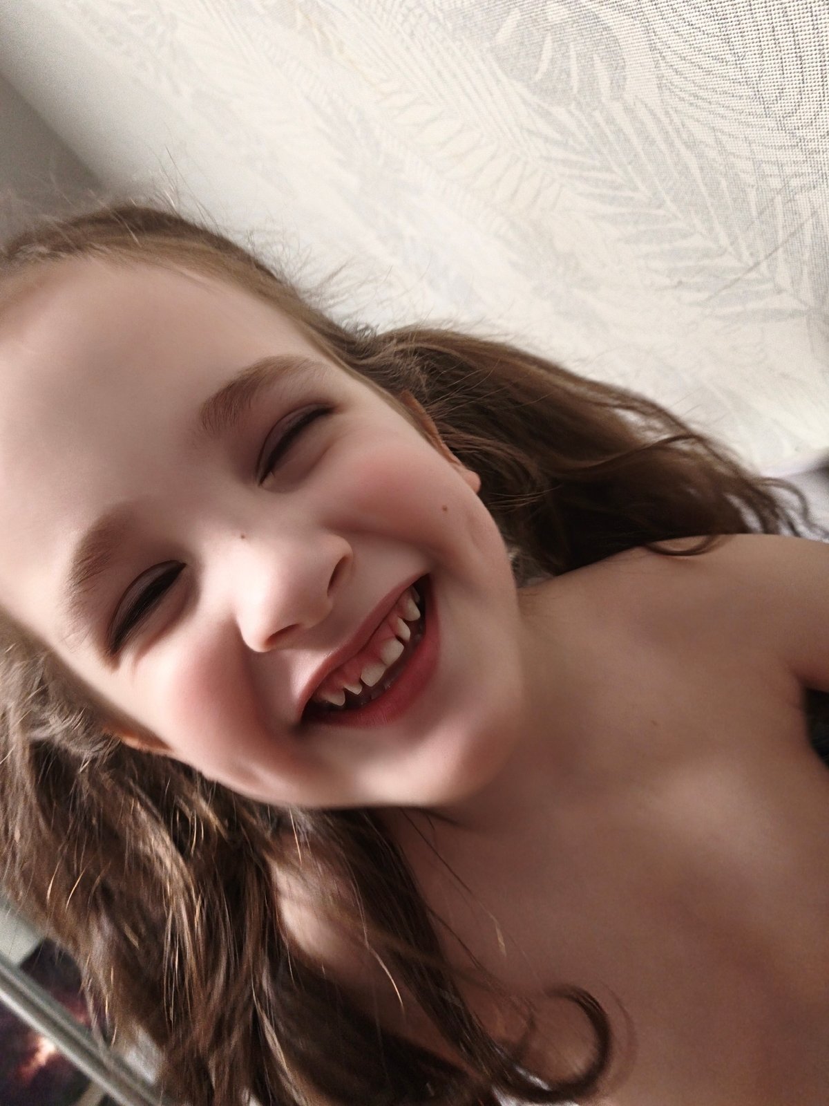 Joyful child and blue-eyed cat captured in afternoon portraits