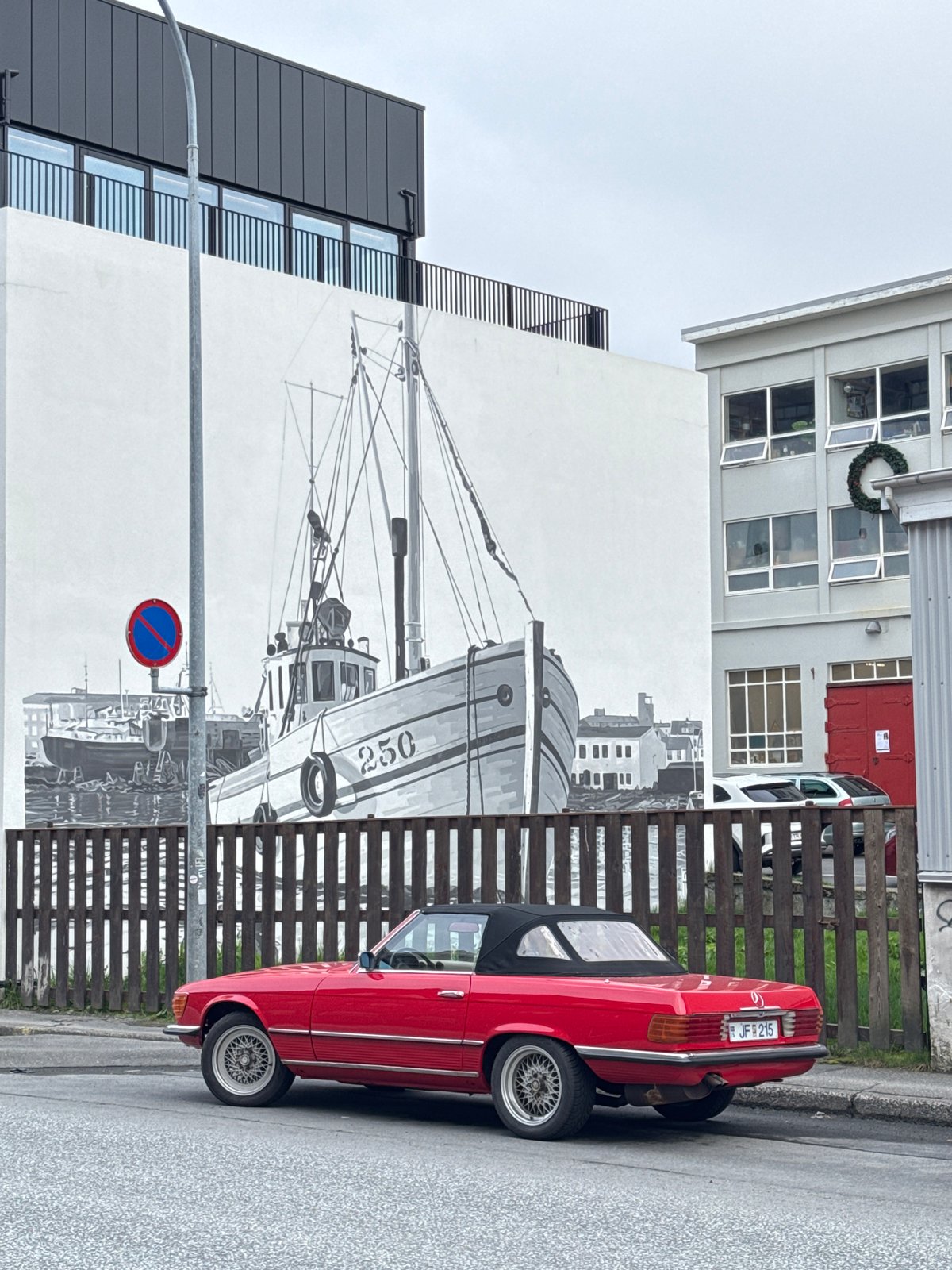 Red Mercedes spotted in Reykjavik with restaurant dining observed