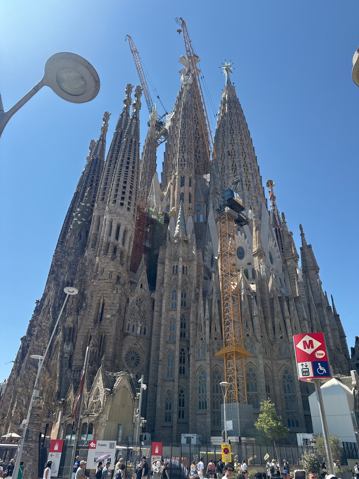 Sagrada Família spires under a clear Barcelona sky