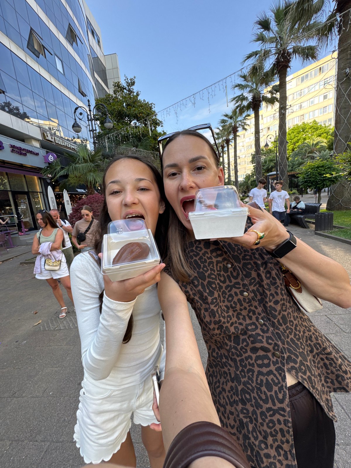 Woman documents afternoon dessert tour through Sochi's walkways