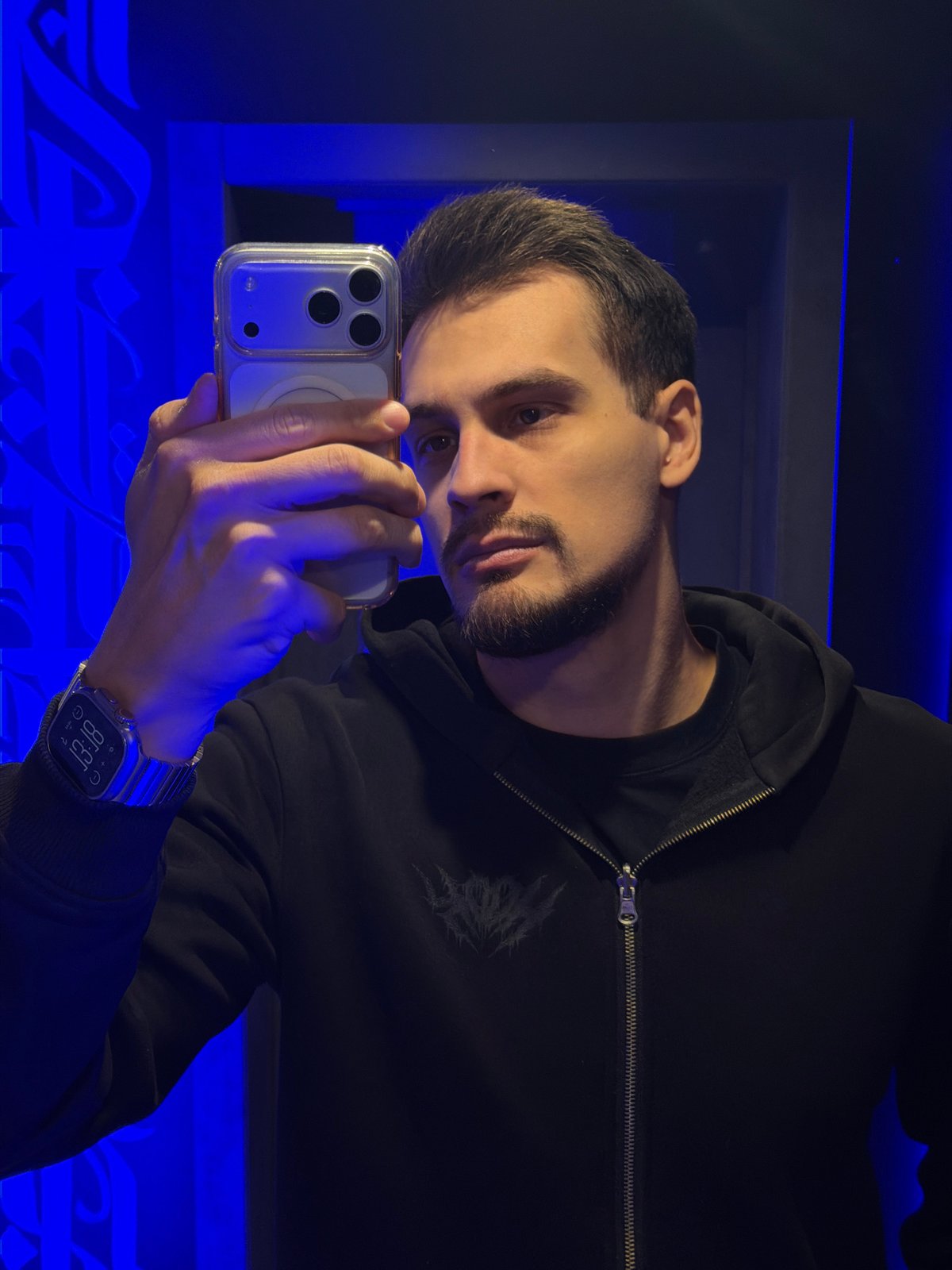 Morning activities documented in Krasnoyarsk: selfie and car cleaning