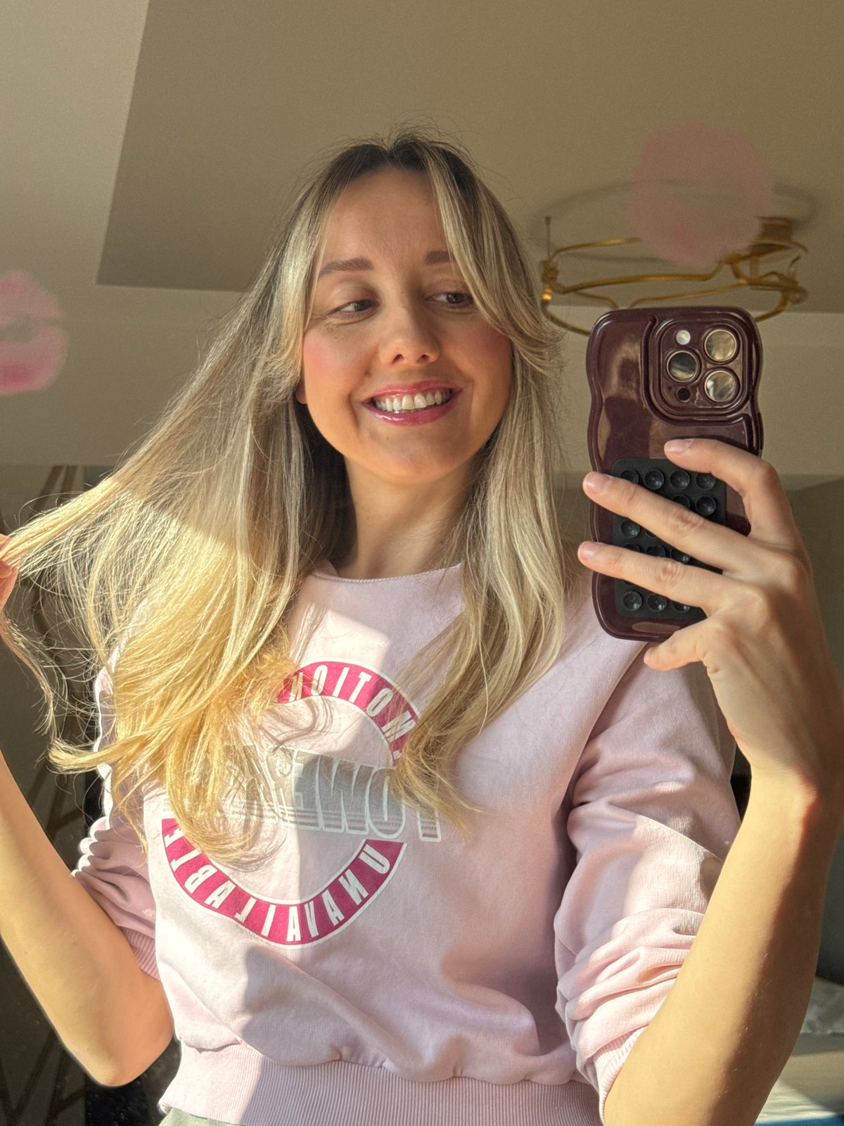 Woman documents morning makeup routine in Carnikava, Latvia