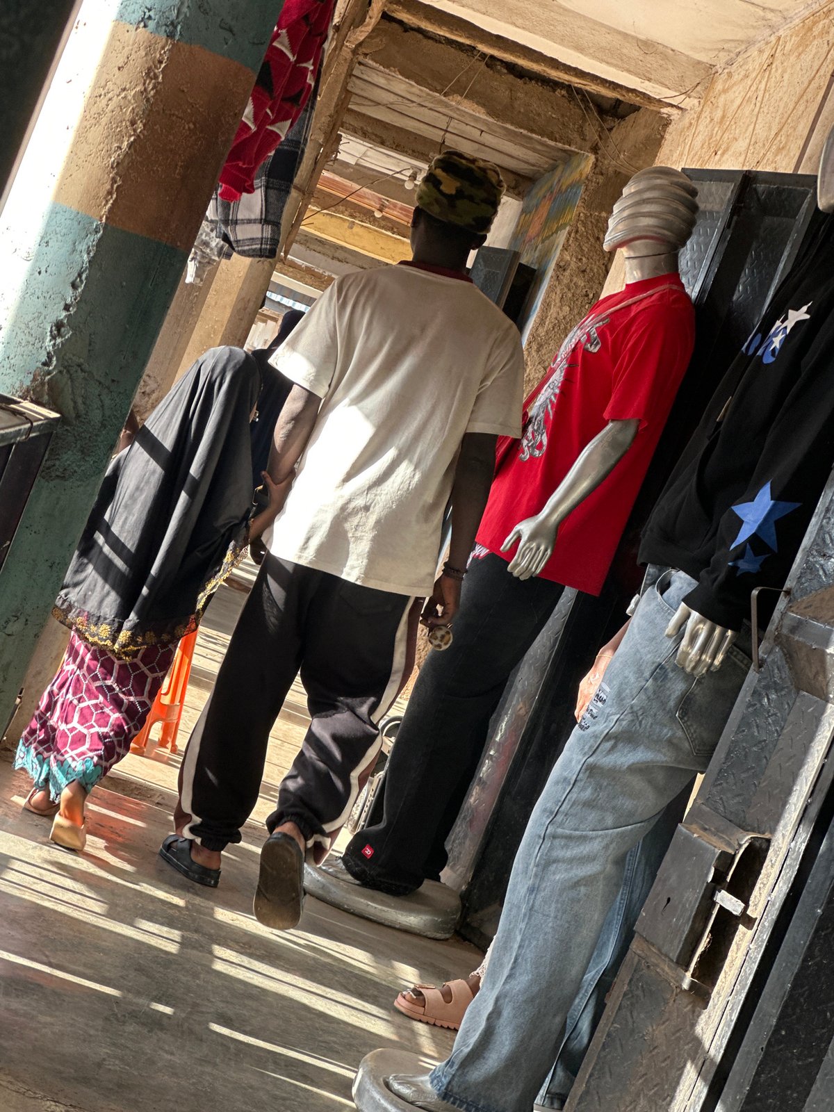 Street commerce and daily hustle in Bukuru's busy market district