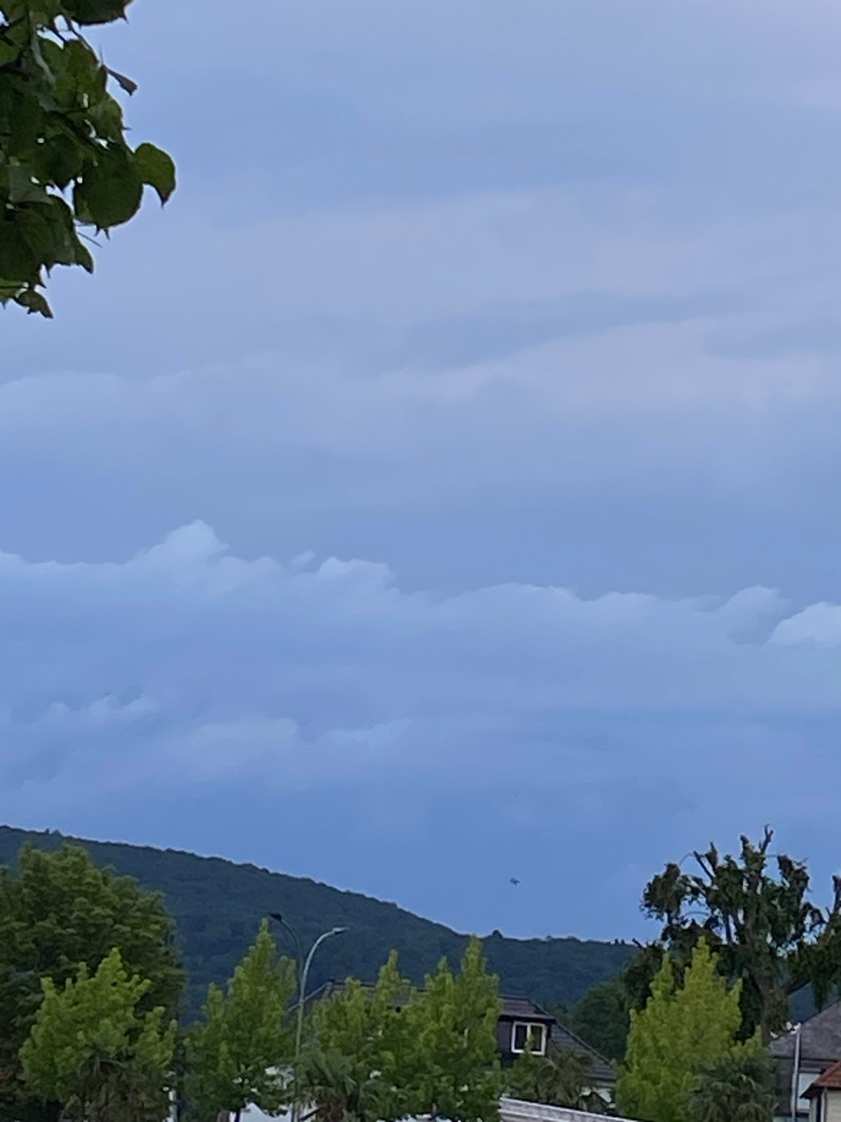 Overcast evening at Rinteln's Weser riverfront and beach bar
