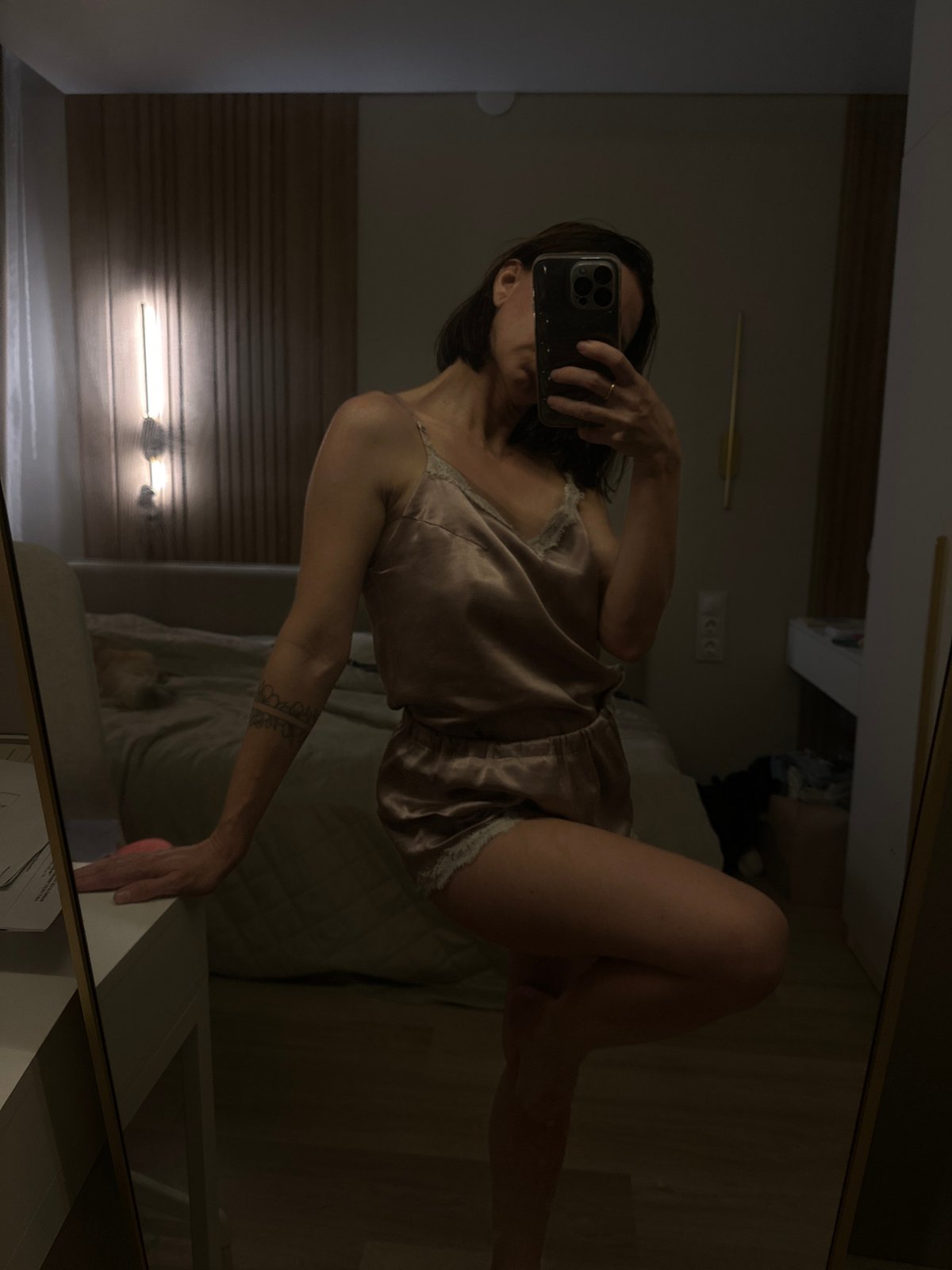Mirror selfie session in a Votkinsk bedroom, multiple poses