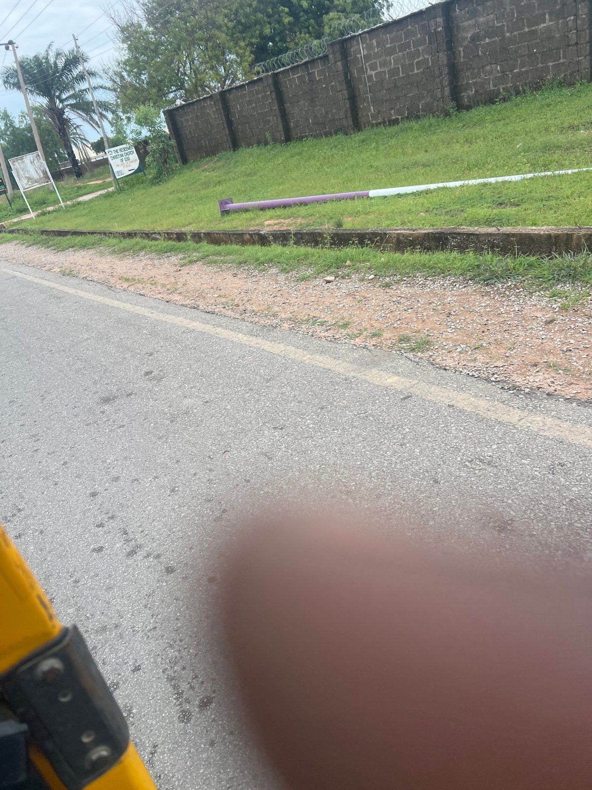 Rickshaw ride through Jalingo's streets, mid-morning June 2026