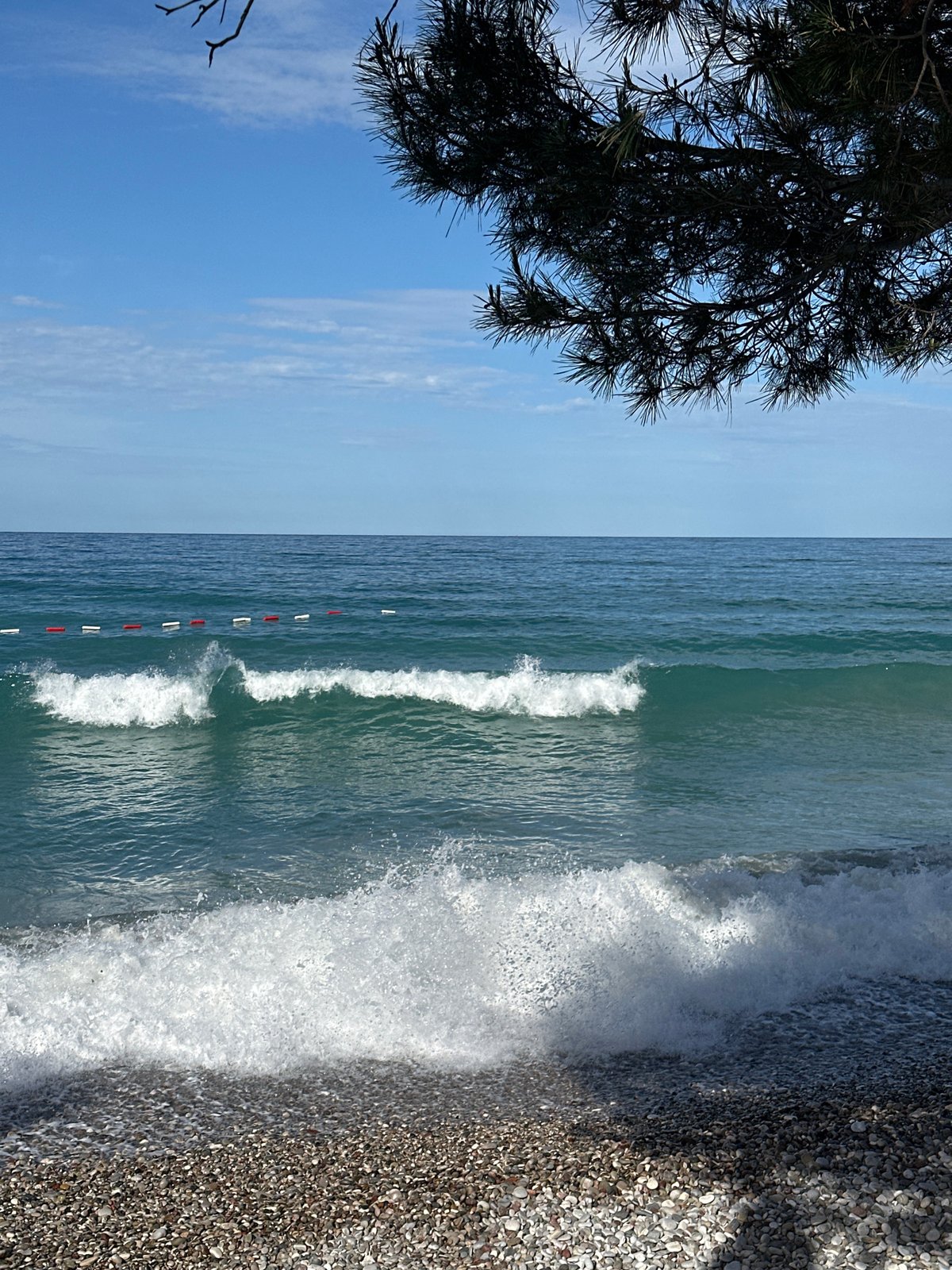 Morning coffee break captured at Šušanj beach, Montenegro