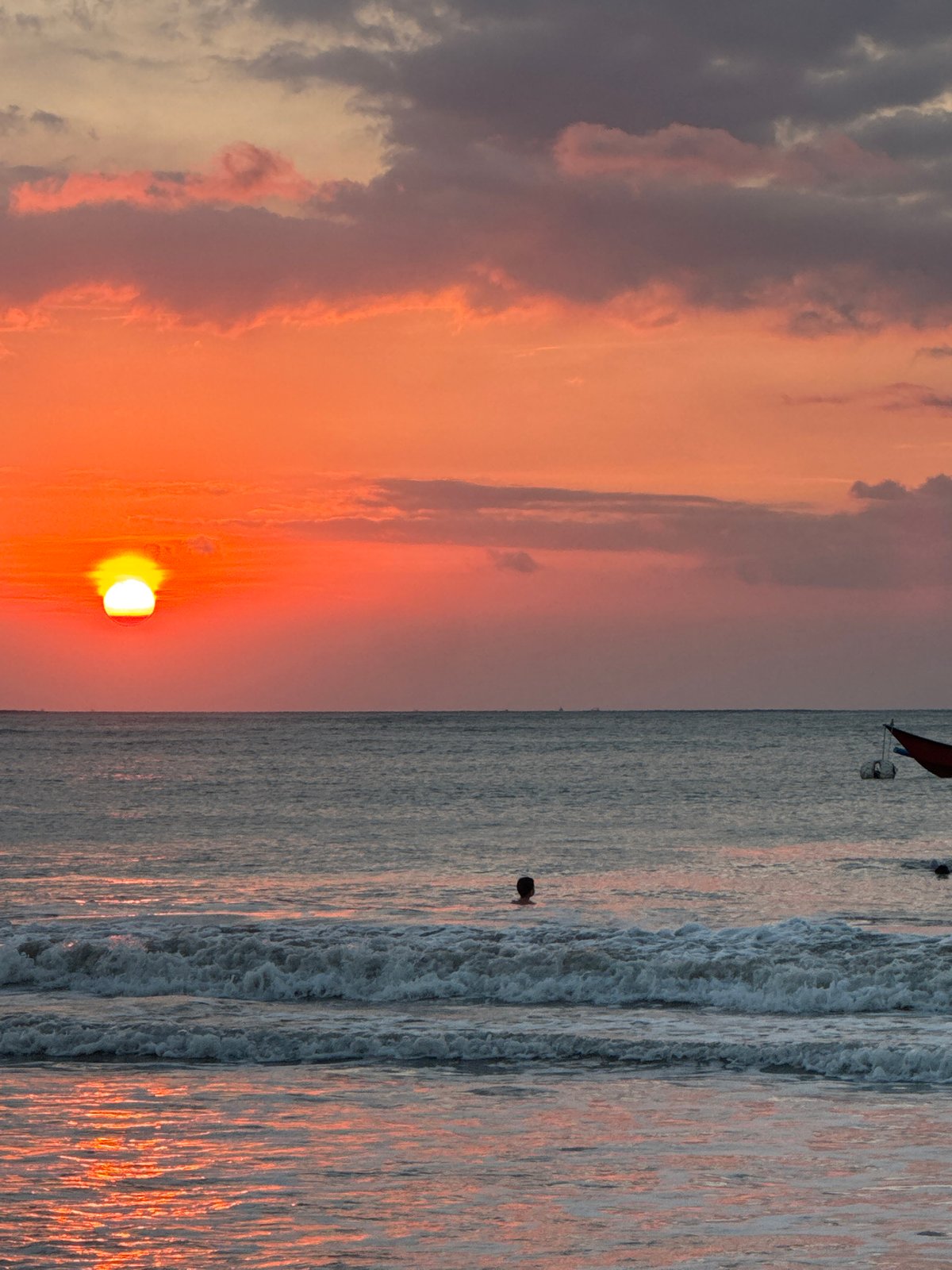 Sunset beach scenes documented across Kuta Selatan coastline