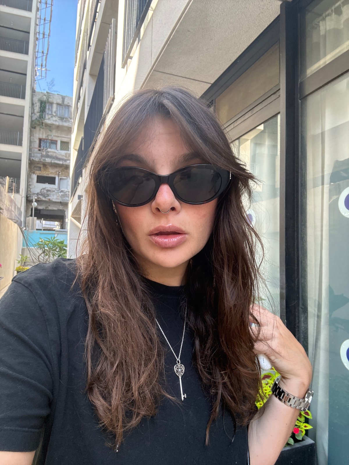 Woman takes mirror selfies in Tel Aviv elevator