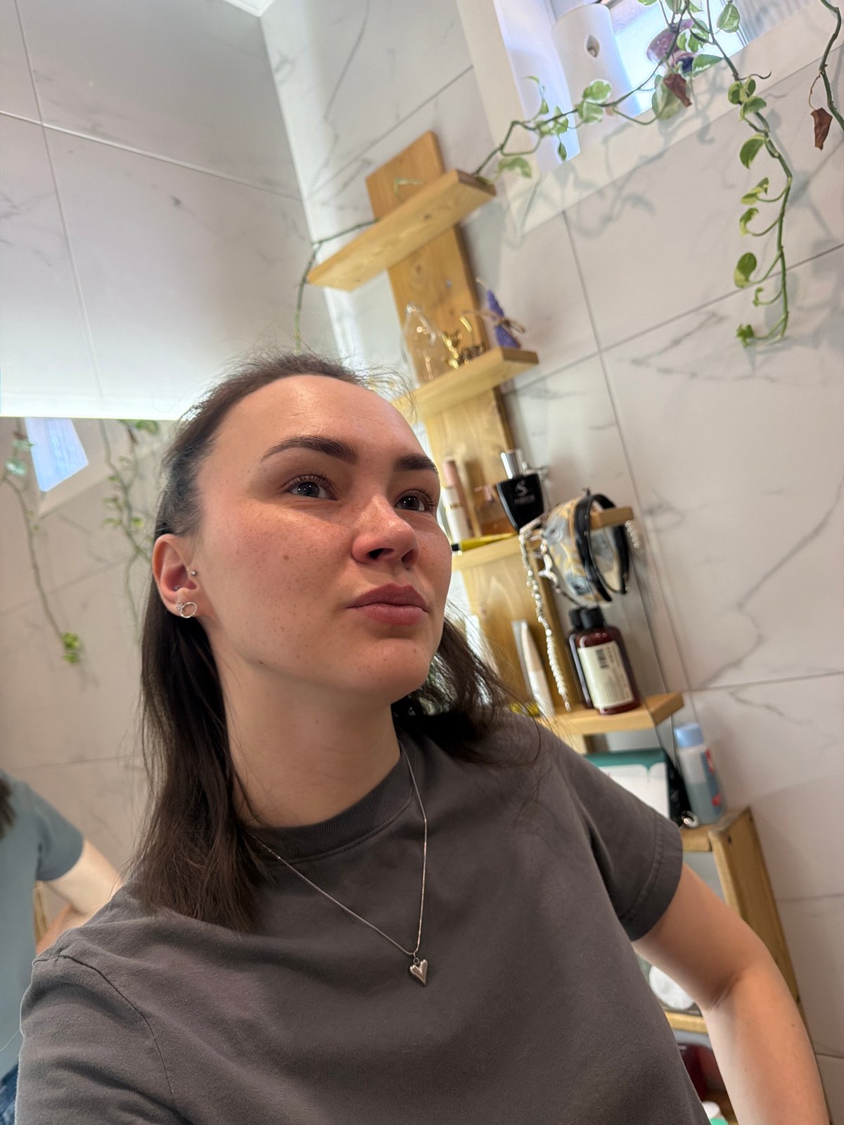 Woman takes bathroom selfie in Chaikovsky, Russia