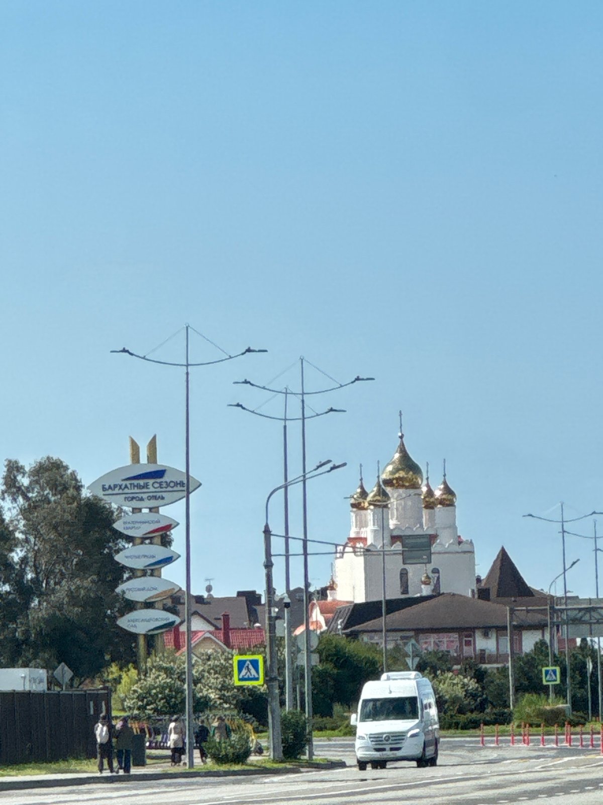 Morning street activity and landscaping work observed in Sirius, Russia