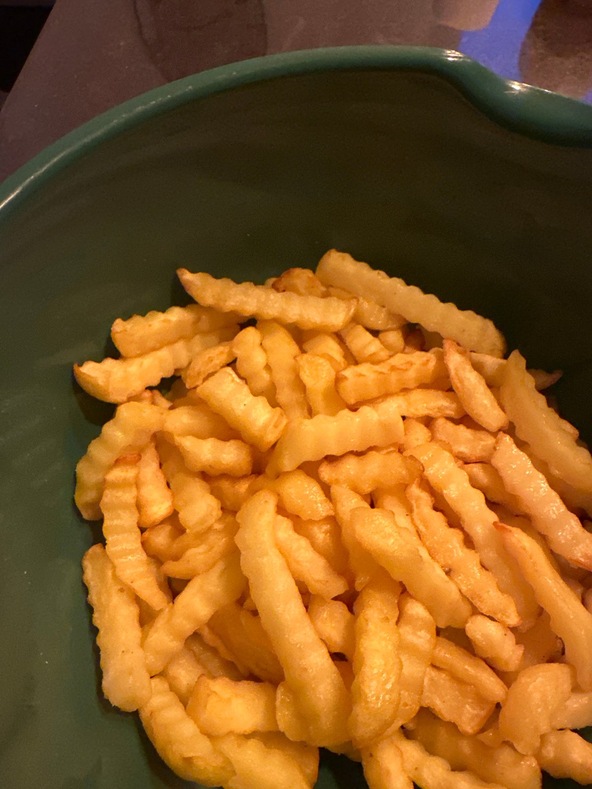 Soccer match viewing with fries documented in Essen living room