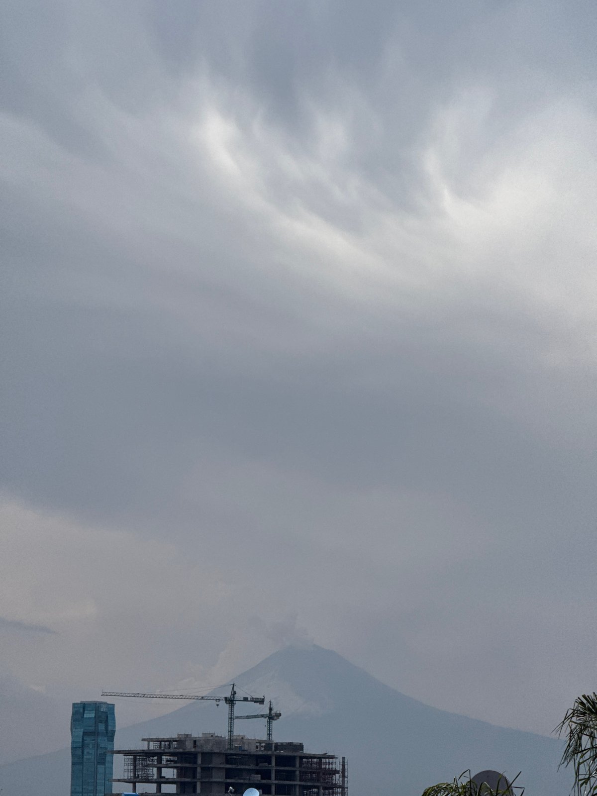 Construction site documented in Puebla, Mexico under cloudy skies