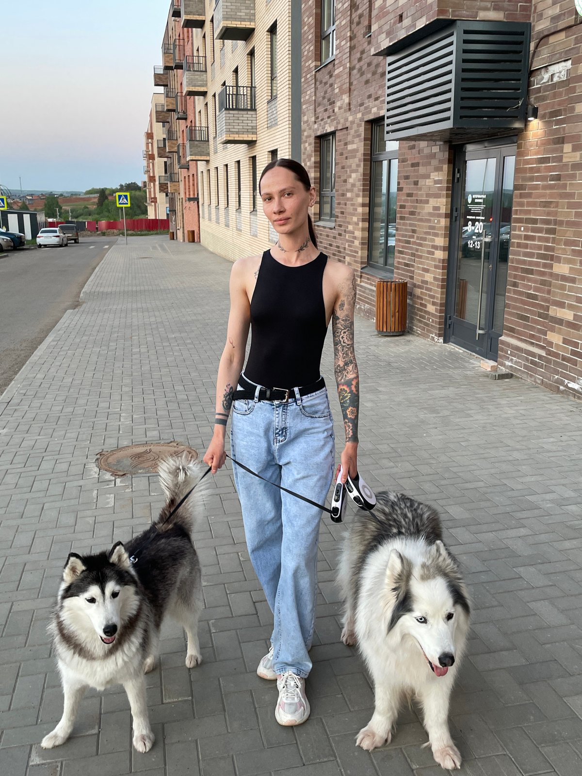 Casual moments captured in Izhevsk: dog walking and elevator selfie