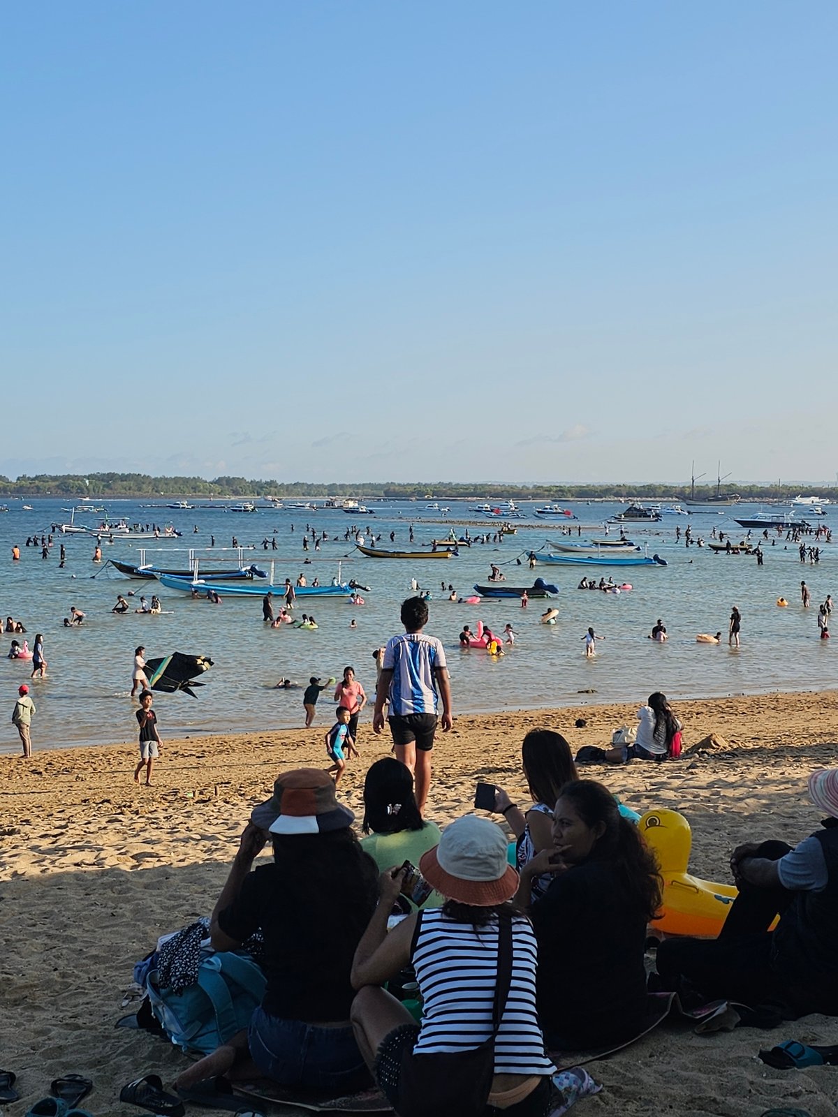 Kite festival and beach crowds fill Sanur on a busy Bali morning