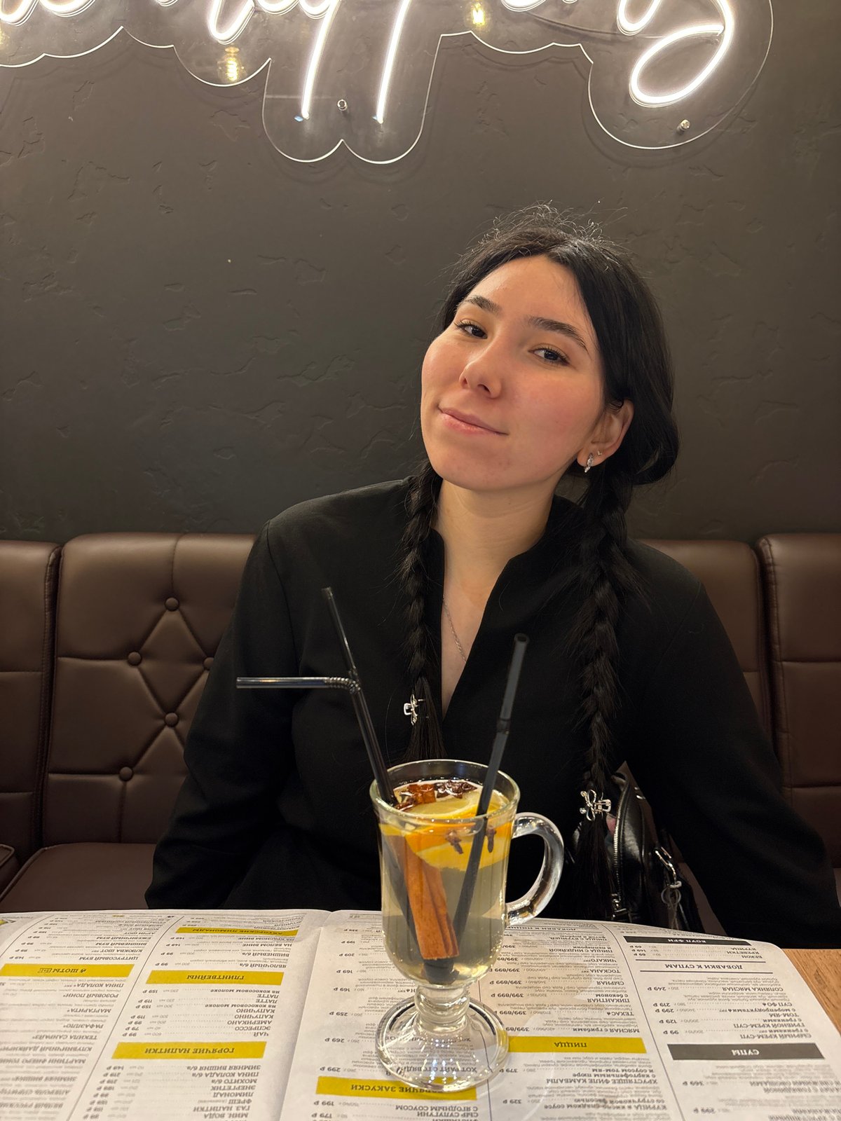 Woman photographed at modern cafe in Izhevsk, Russia