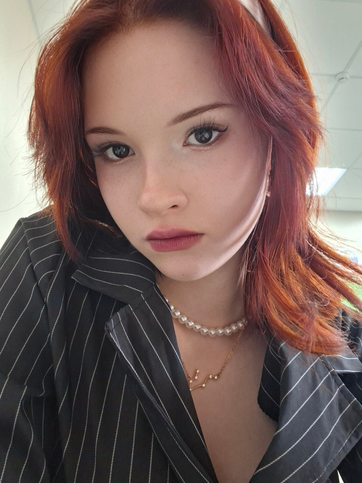 Portrait session of red-haired woman documented in Chaikovsky