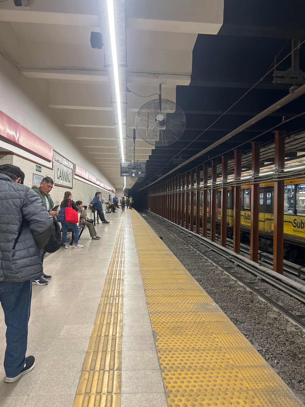 Person takes selfie at Buenos Aires subway station