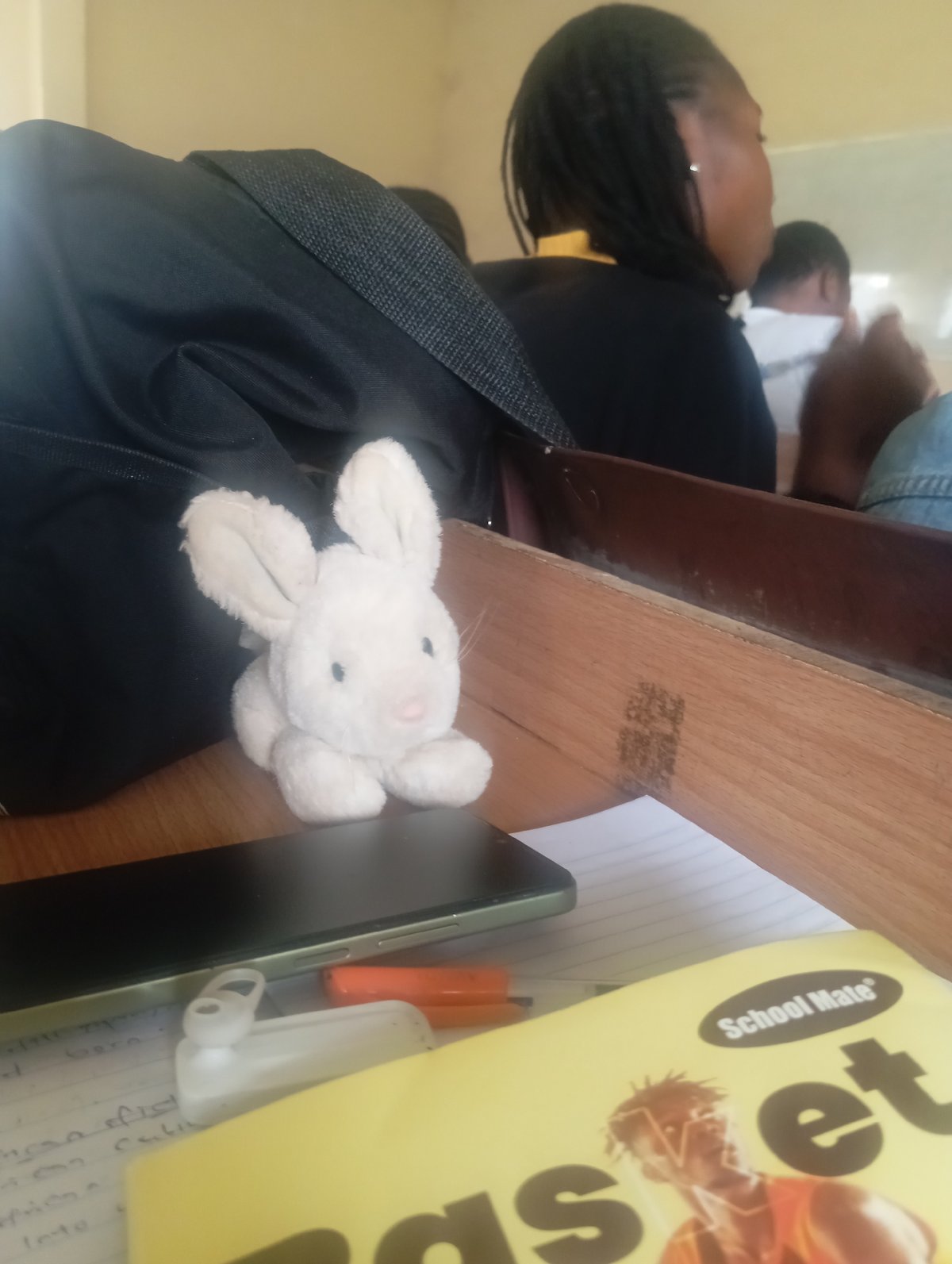 Indoor scenes from a classroom-like space, midday