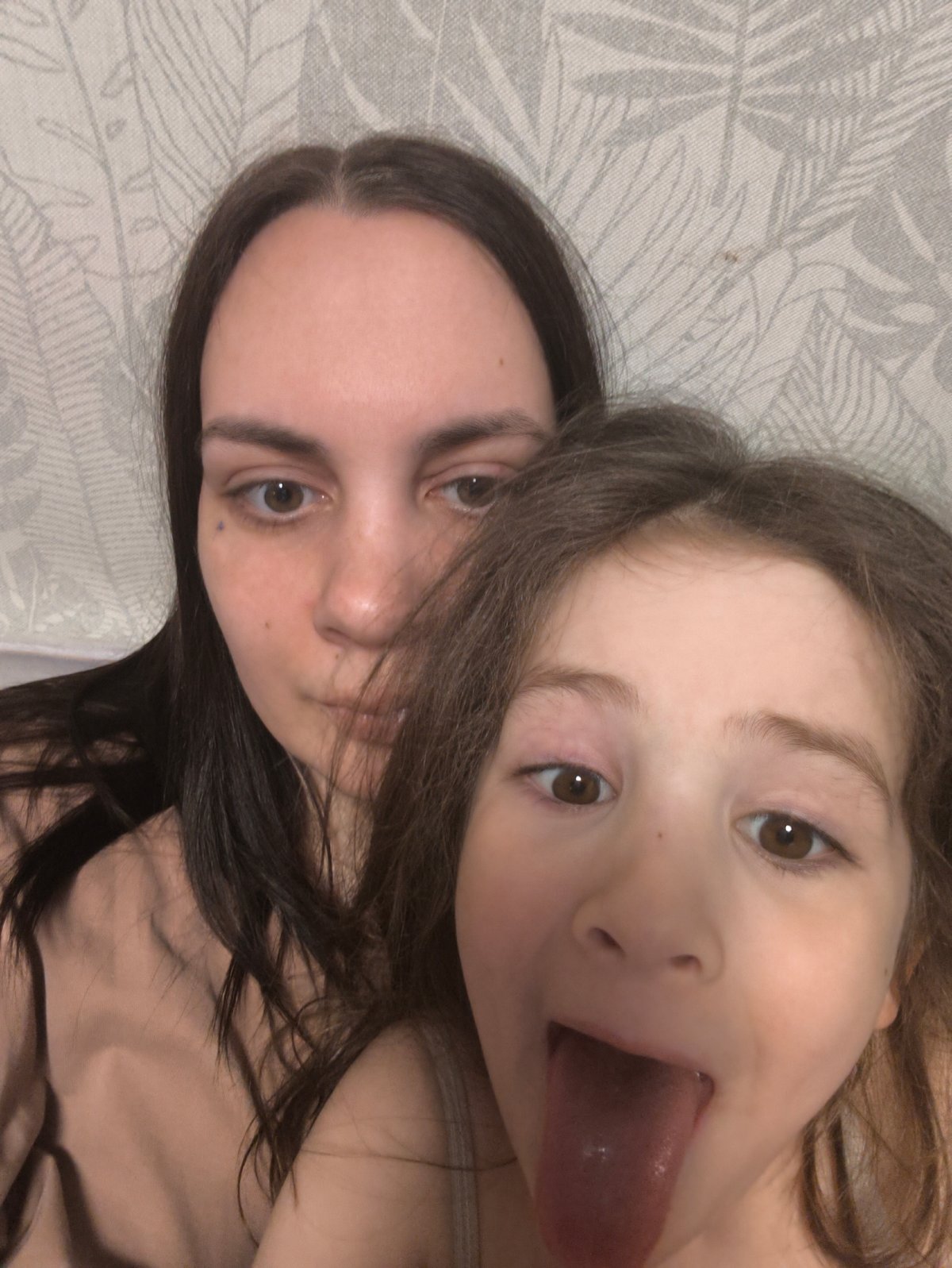 Family selfies with Abyssinian cat captured in Chaikovsky home