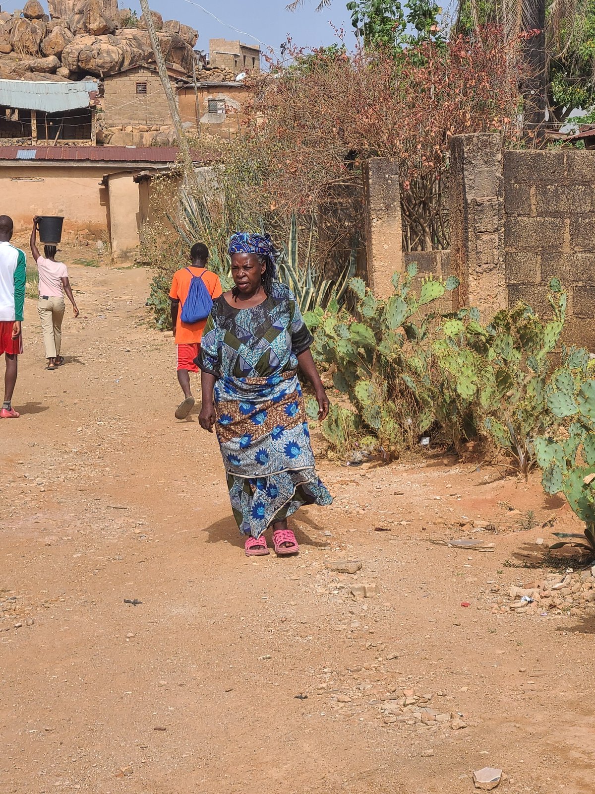 Soccer practice session captured on dirt field in Nigeria
