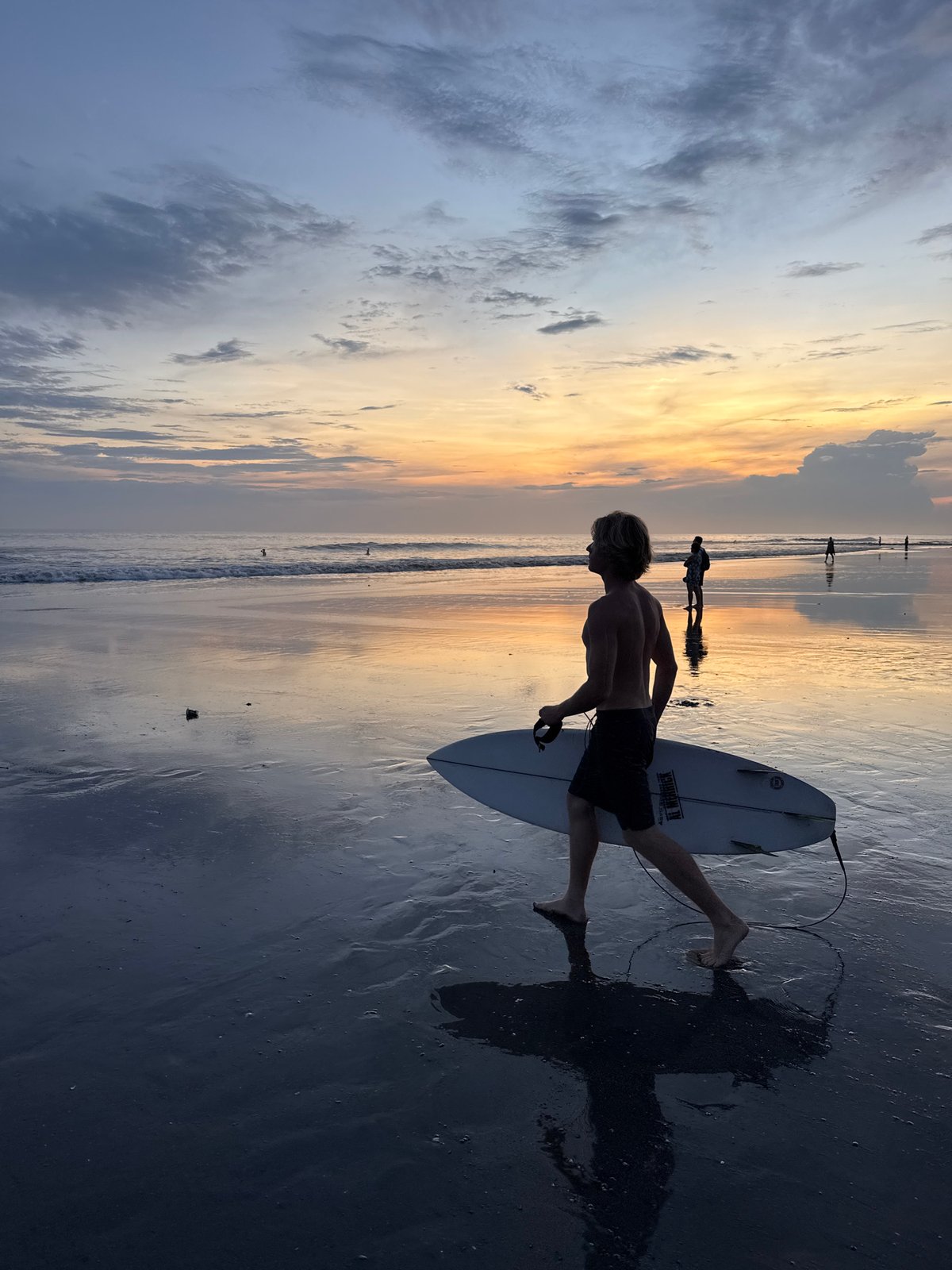 Sunset beach life captured in North Kuta, Indonesia