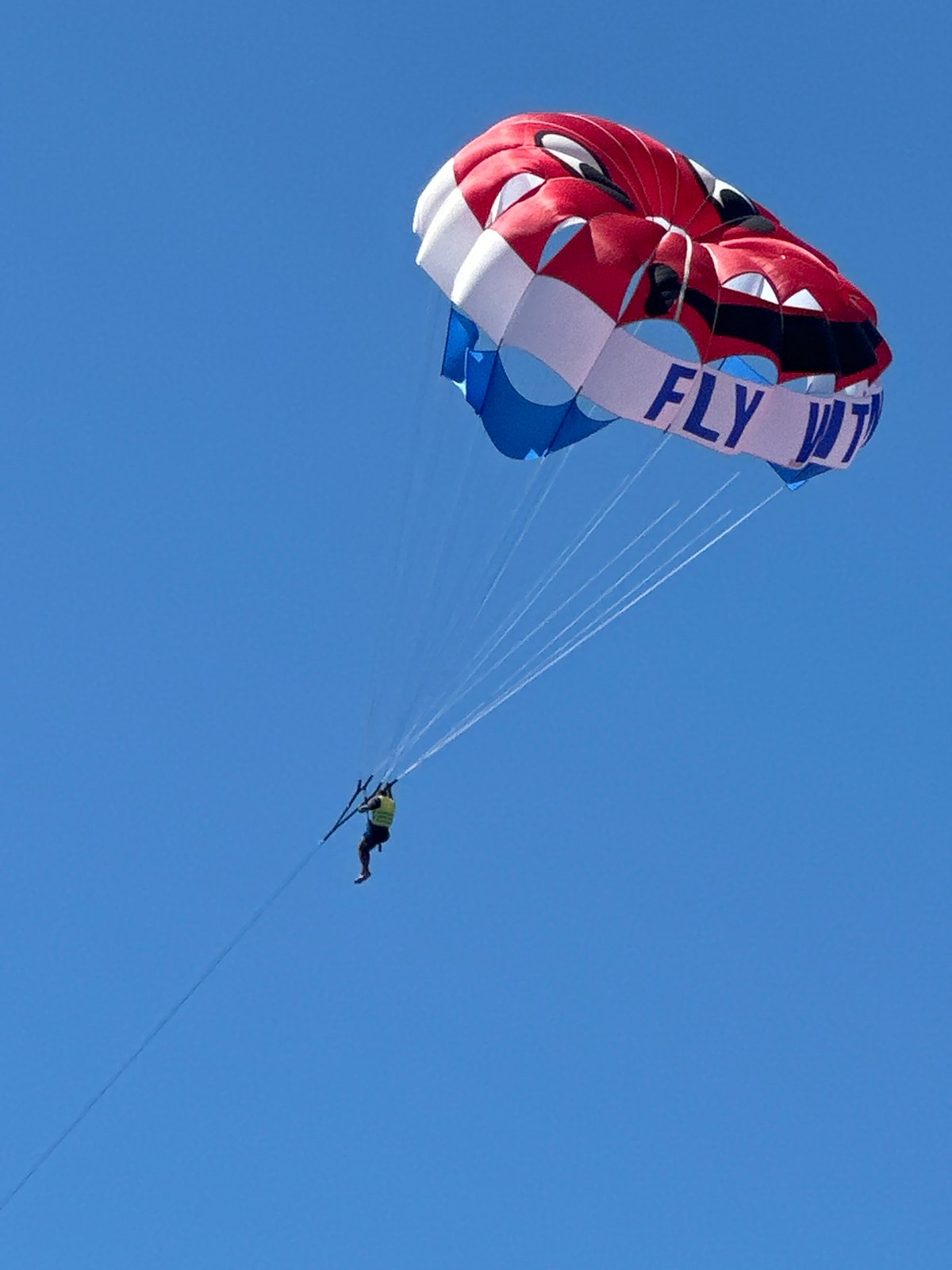 Parasailing and beach activities captured in Budva, Montenegro