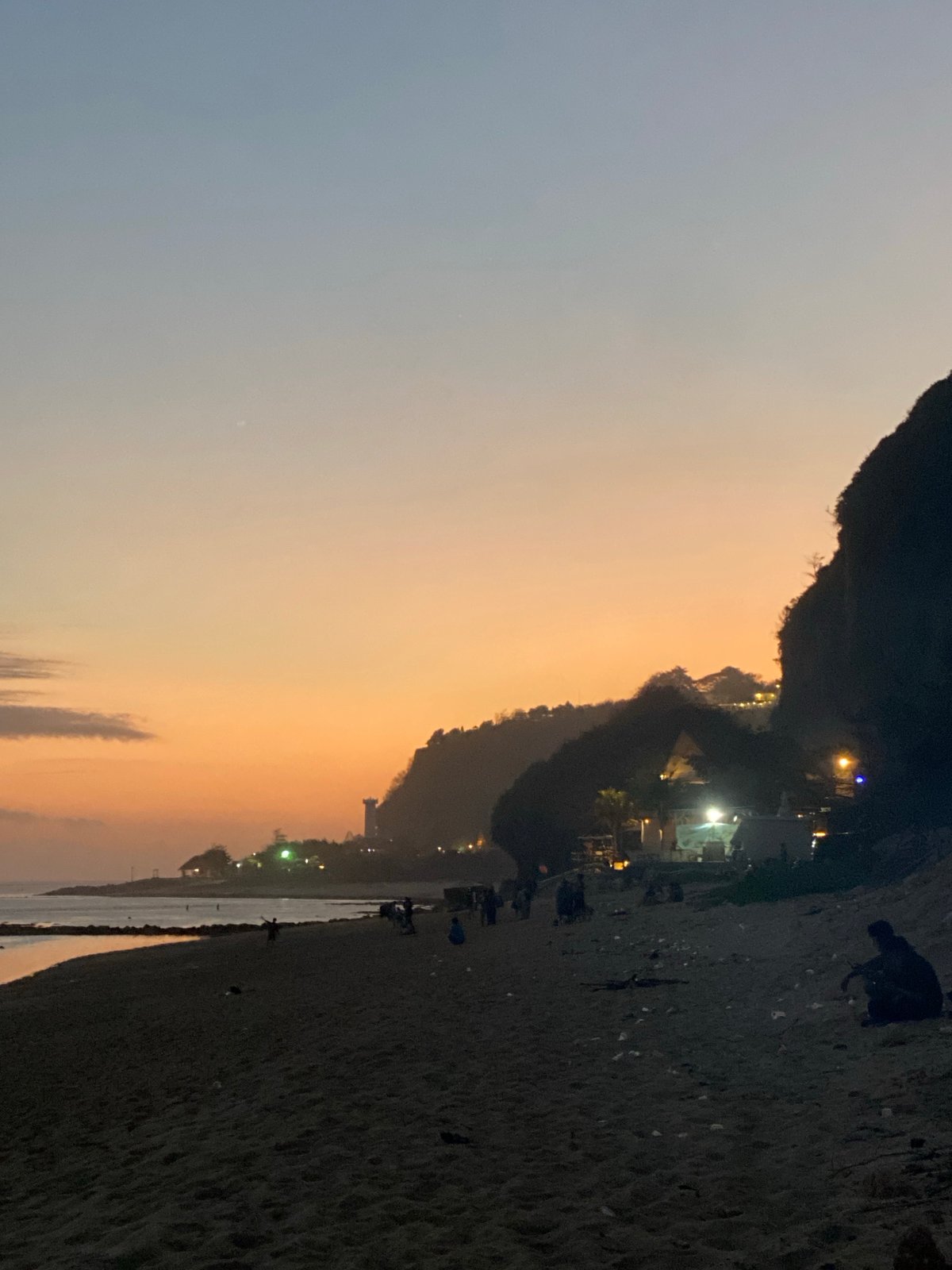 Birthday beach gathering in Kuta Selatan with food, ocean, and festivities