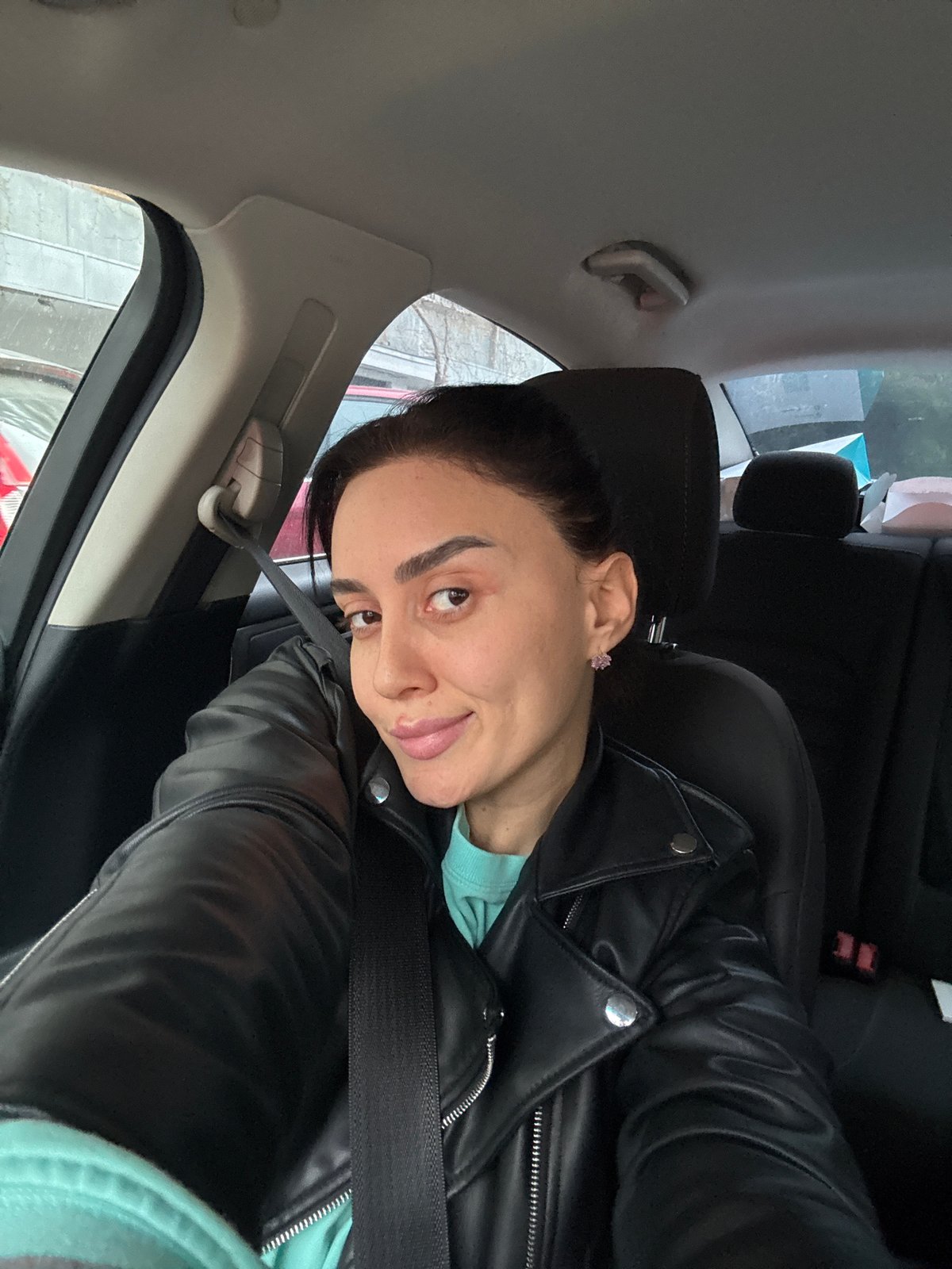 Woman documents leisurely car ride through spring Tbilisi streets